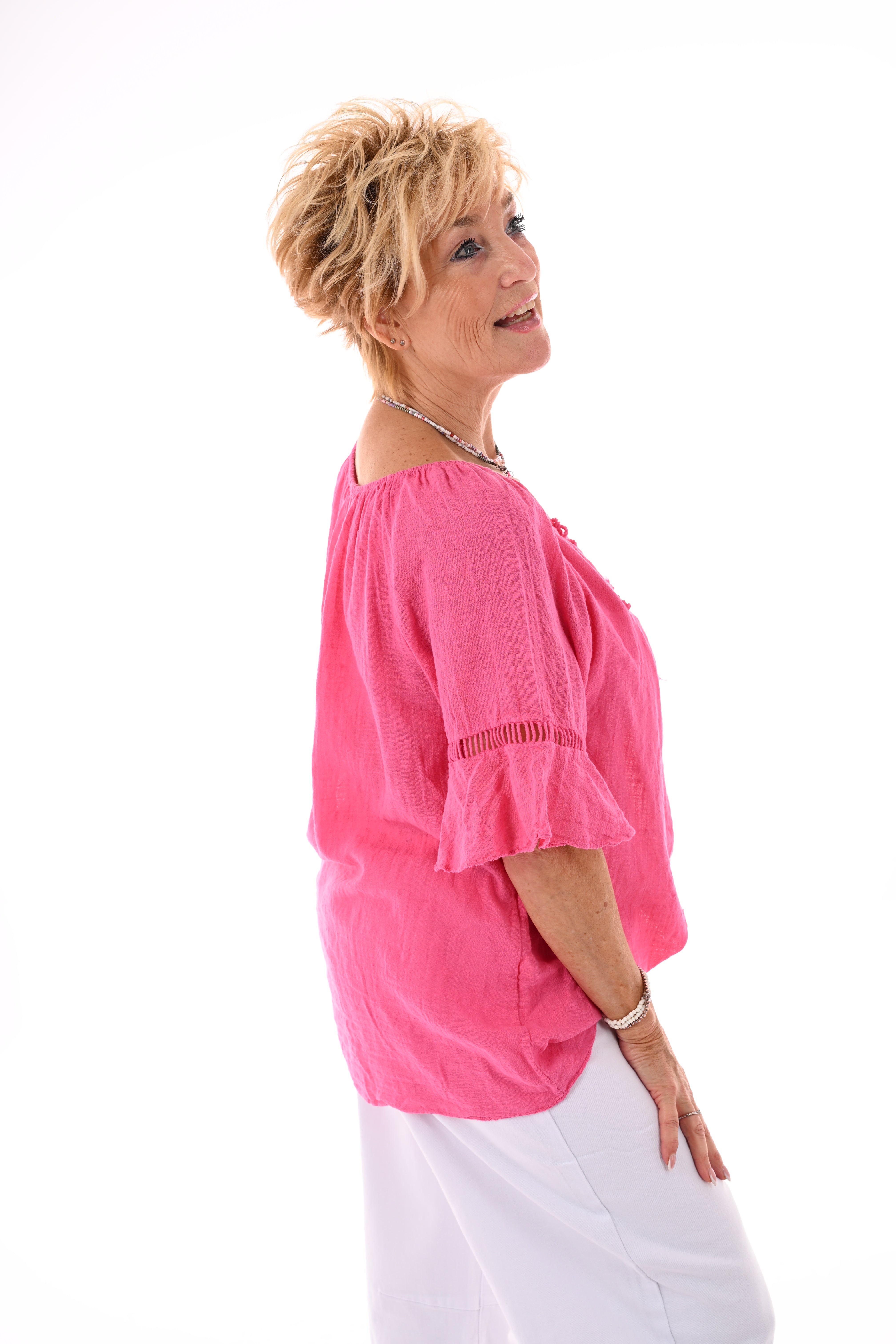 Top ibiza met kwastjes fuchsia