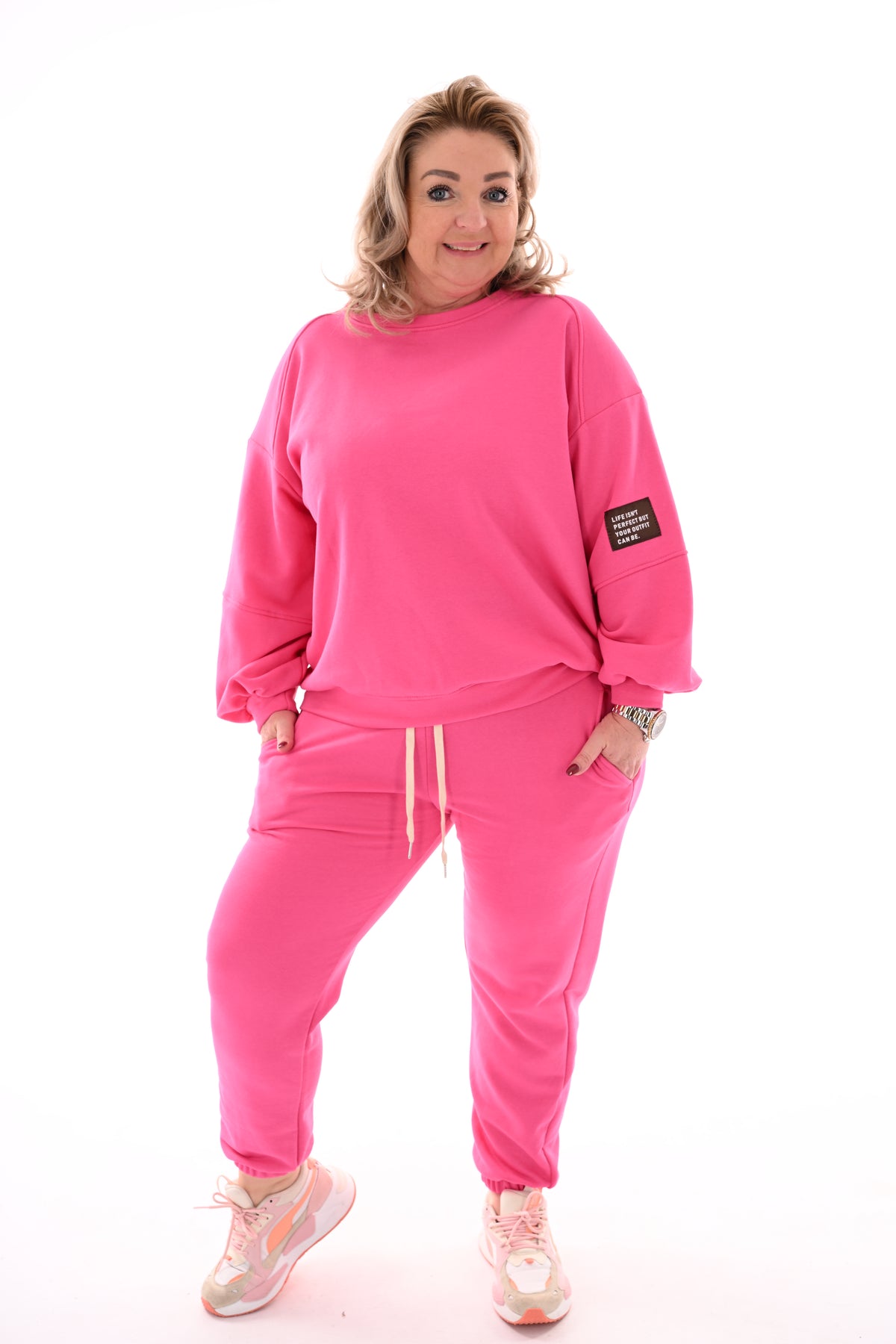 Tweedelig pak pofmouwen applicatie fuchsia