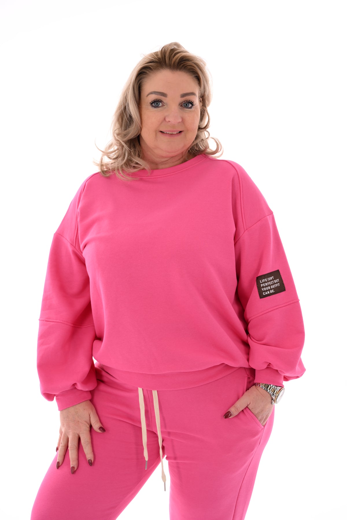 Tweedelig pak pofmouwen applicatie fuchsia