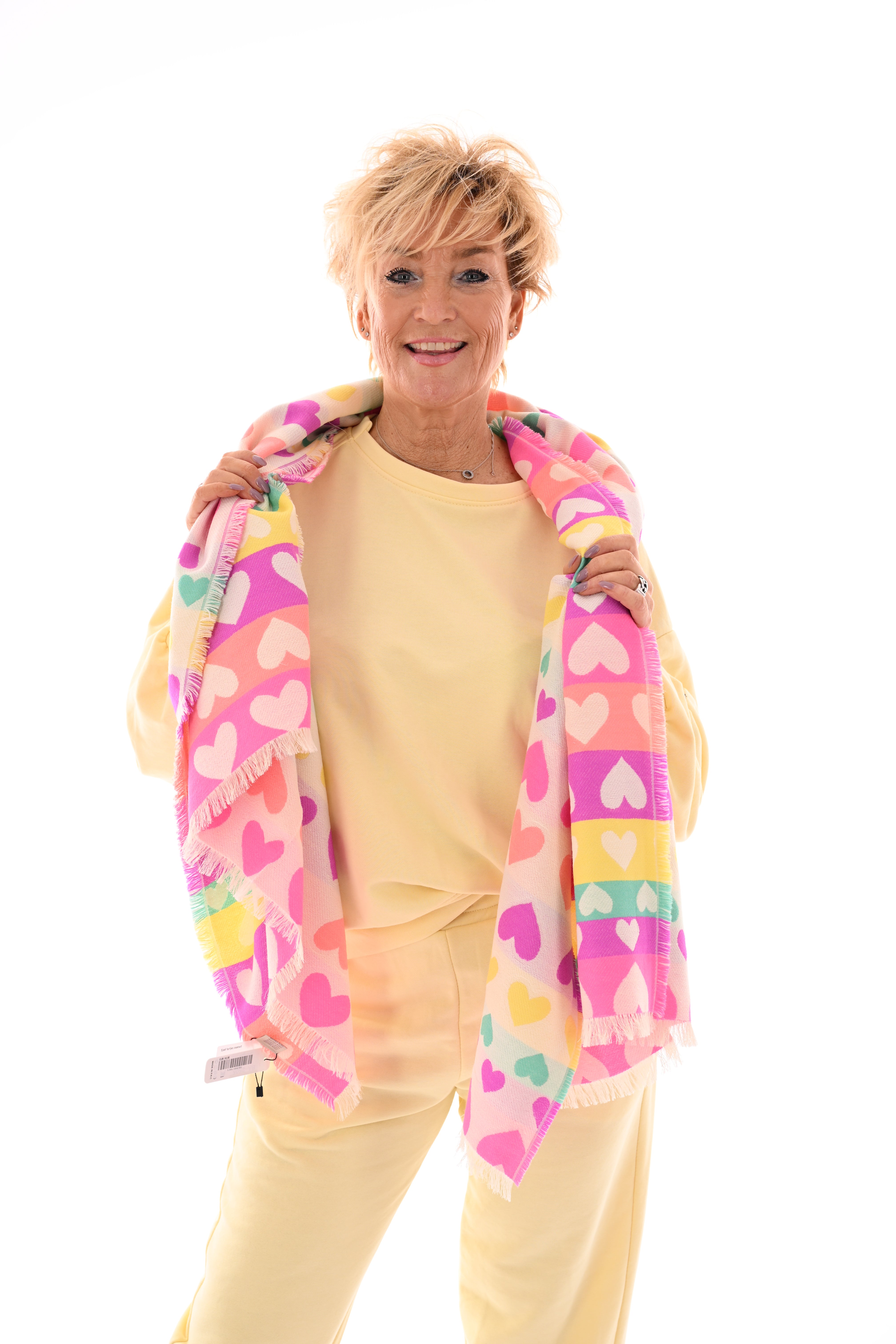 Tweedelig pak pofmouwen applicatie botergeel