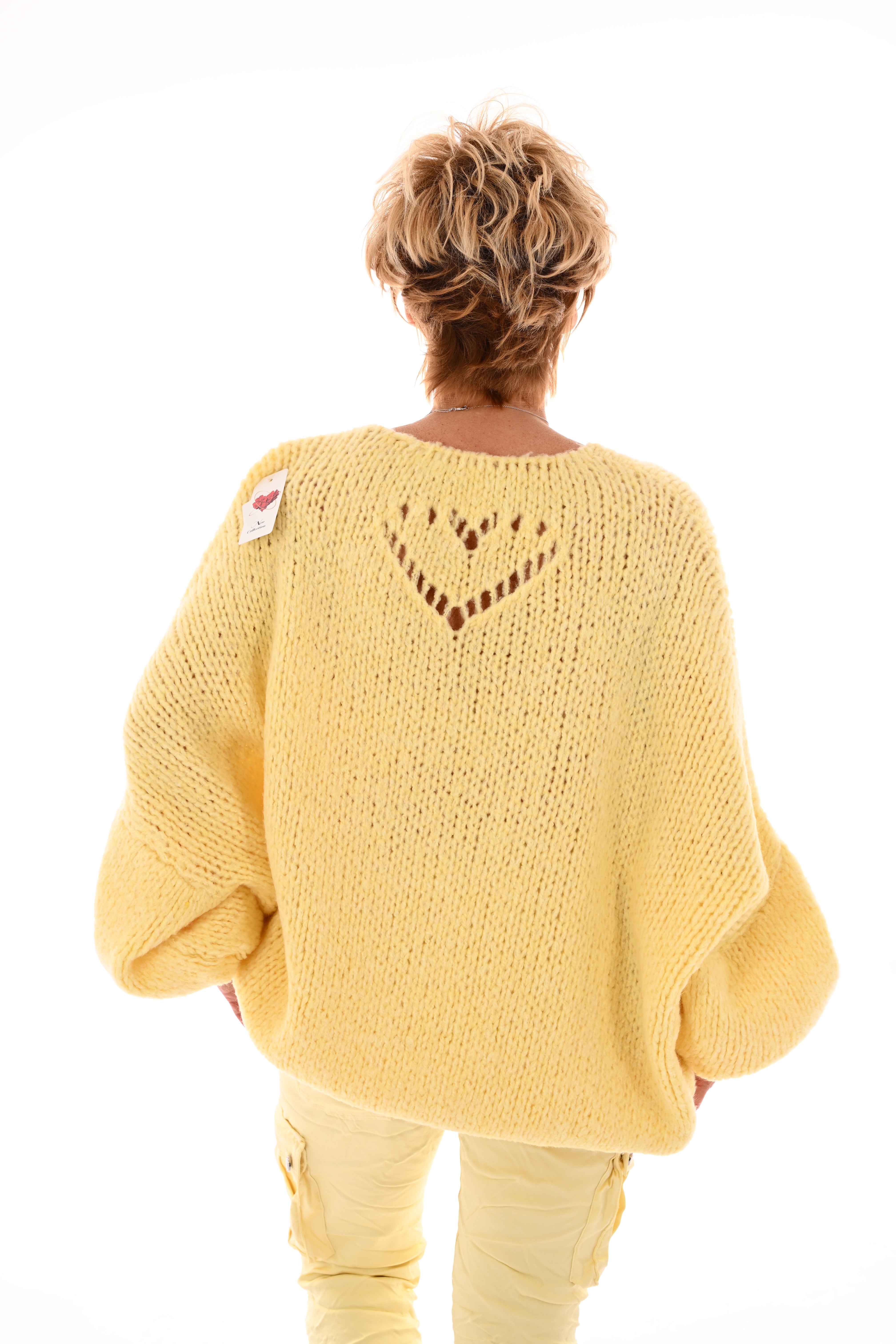 Gebreide trui met hart achterkant lichtgeel