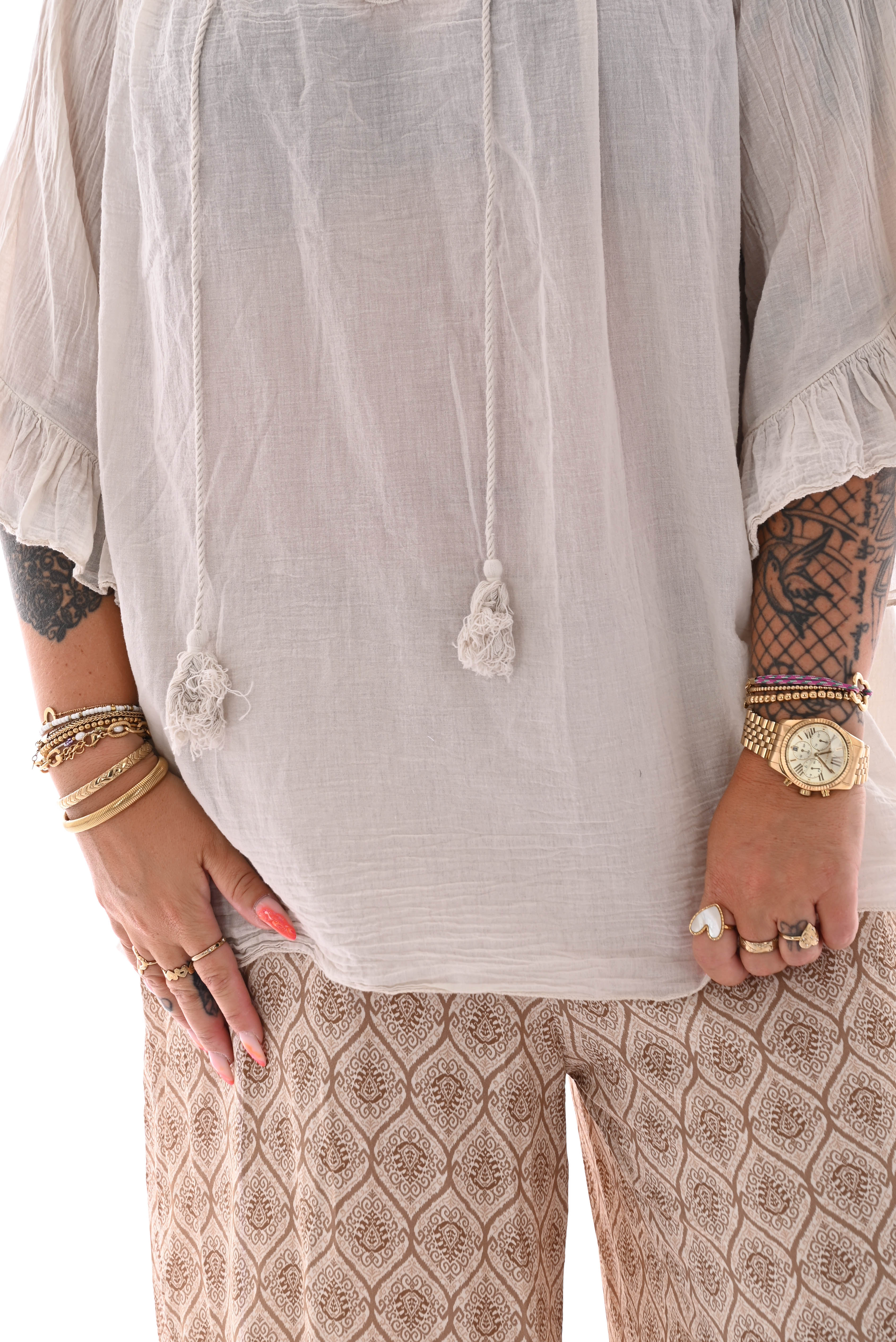 Top gehaakte rand trompetmouwen beige