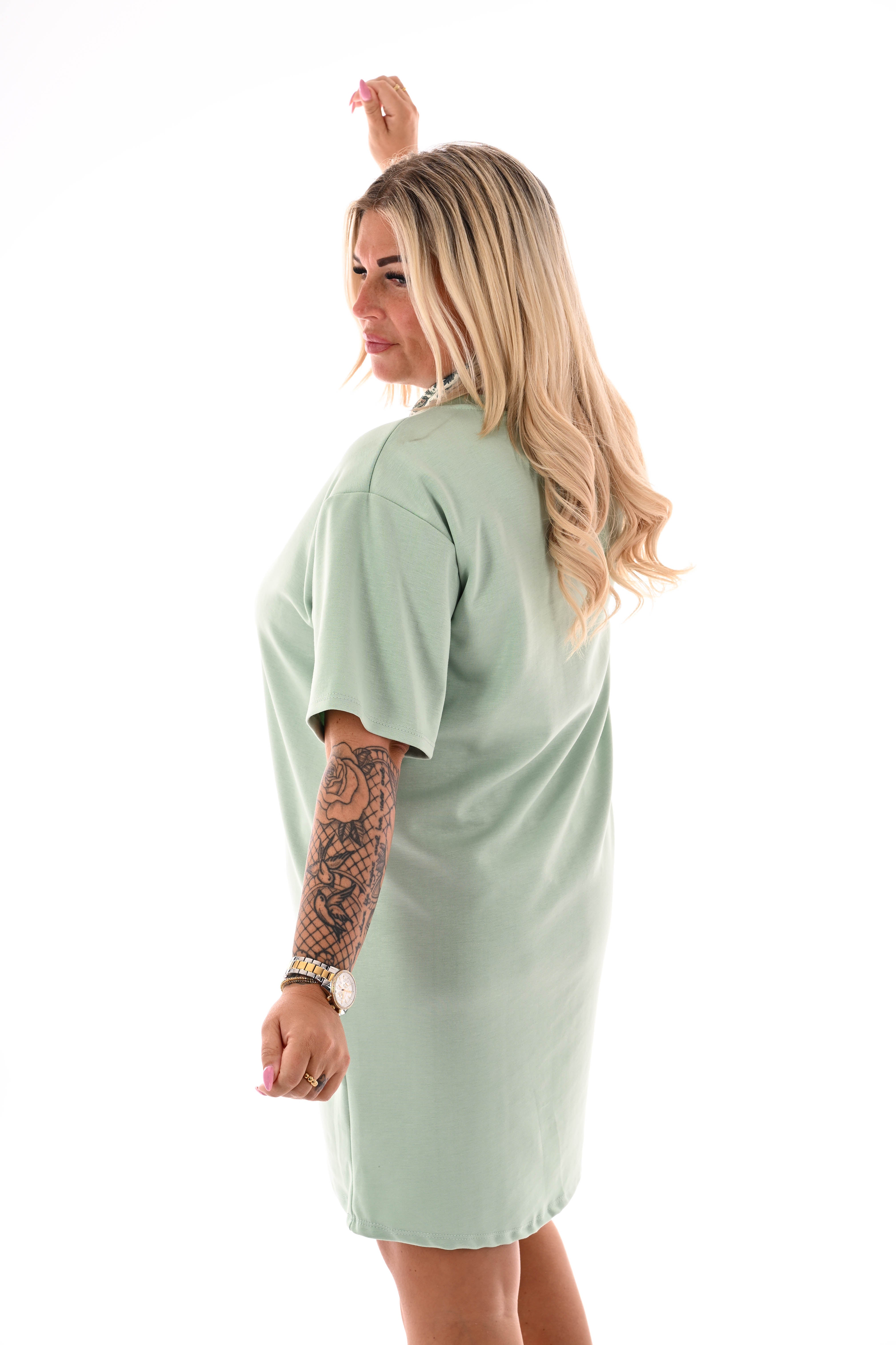 Korte sweaterdress v-hals uni lichtgroen