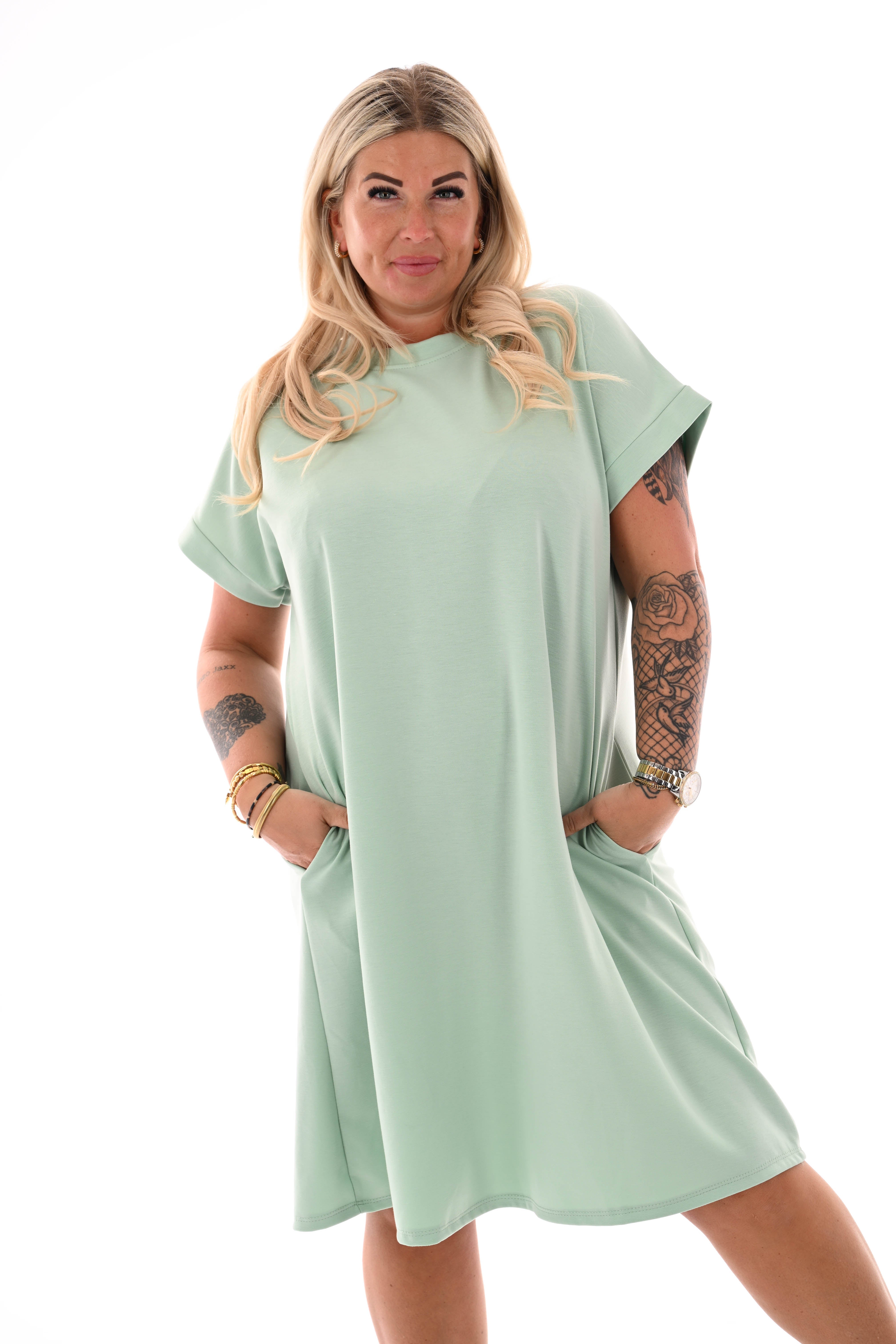 Sweaterdress ronde hals zakken korte mouwen lichtgroen