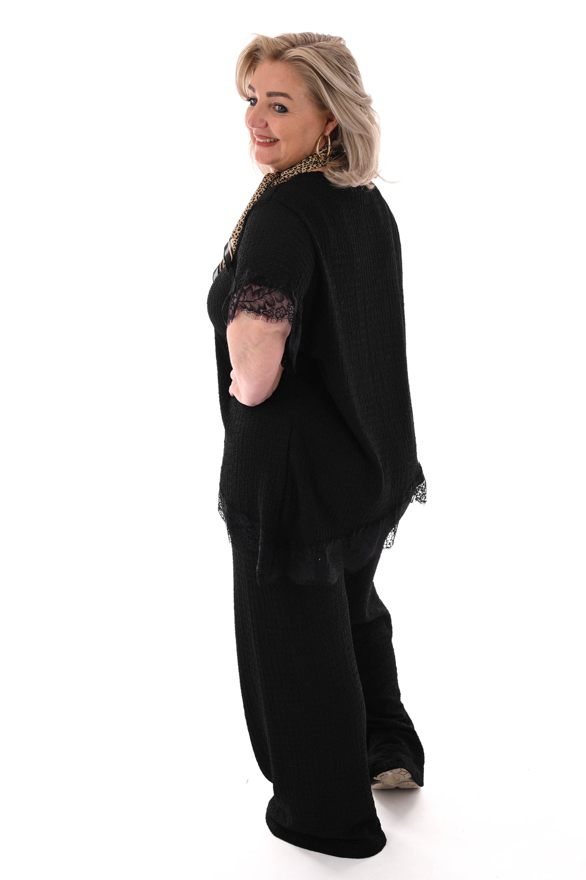 Tweedelig crepe set asymmetrisch zwart