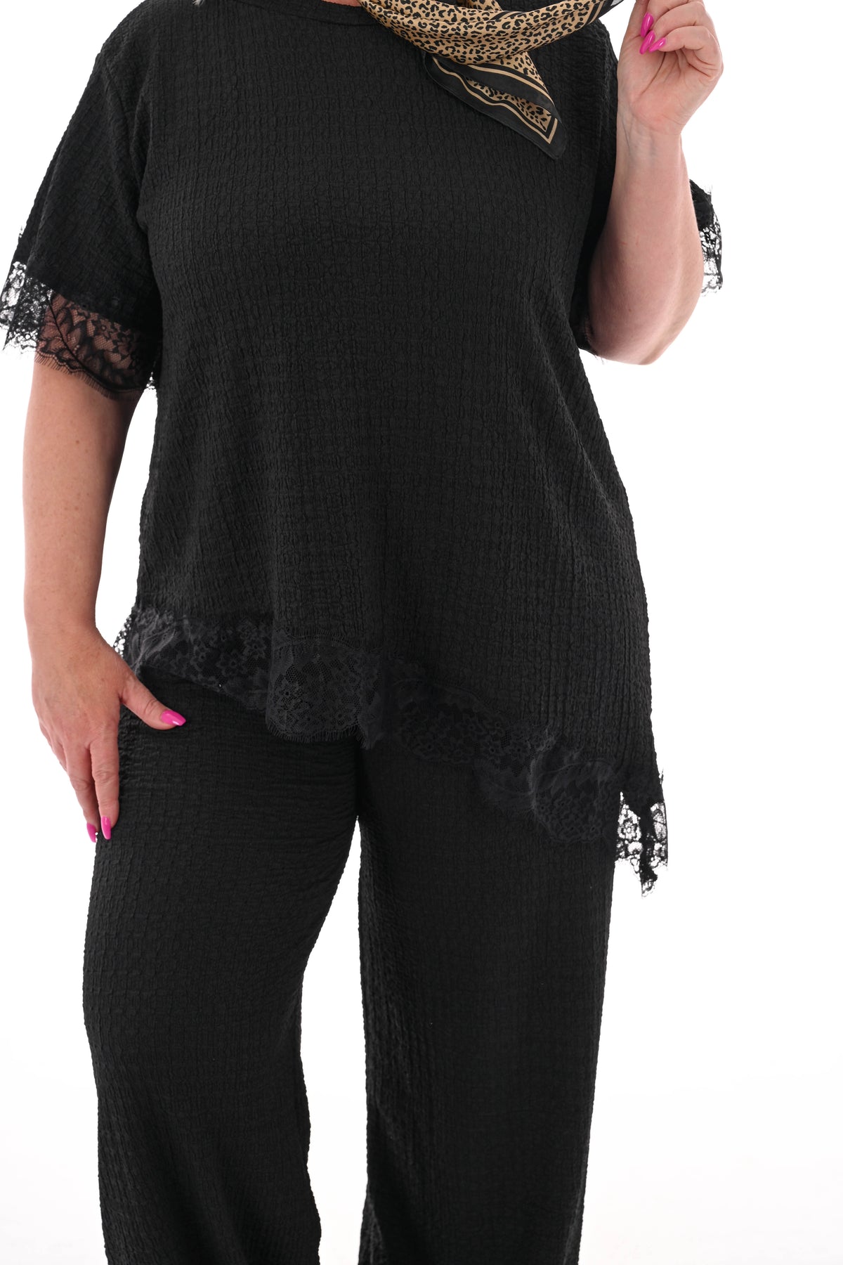 Tweedelig crepe set asymmetrisch zwart