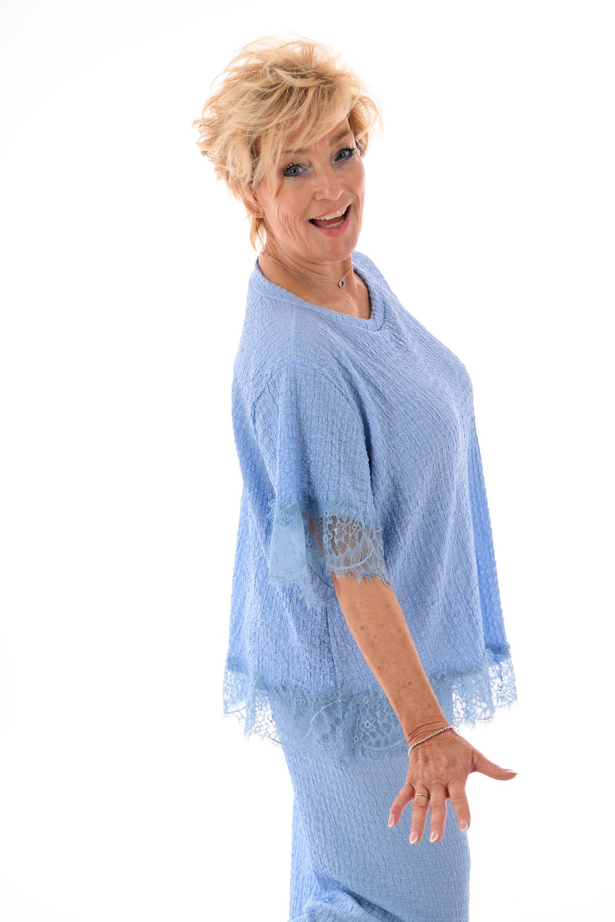 Tweedelig crepe set asymmetrisch lichtblauw