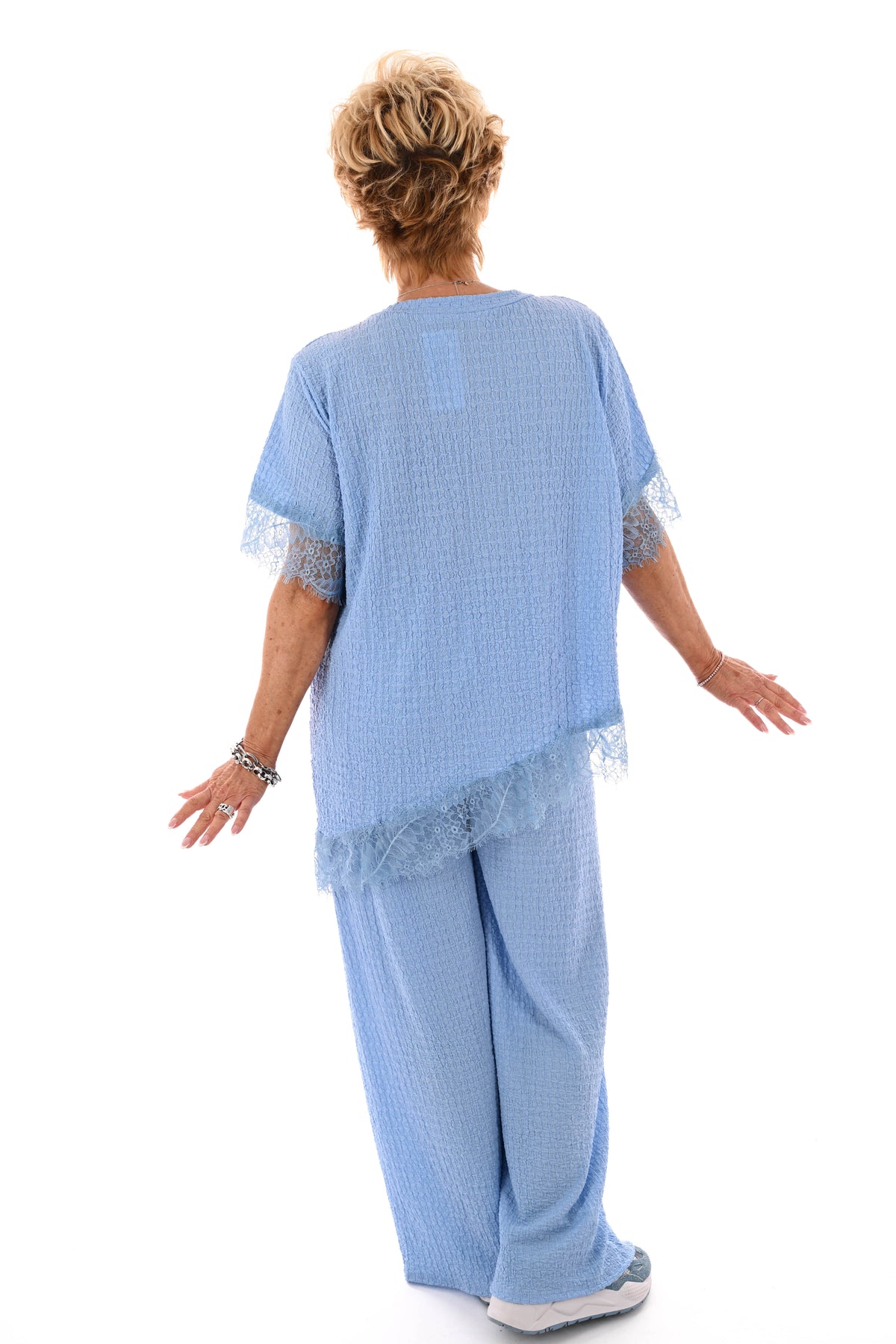 Tweedelig crepe set asymmetrisch lichtblauw