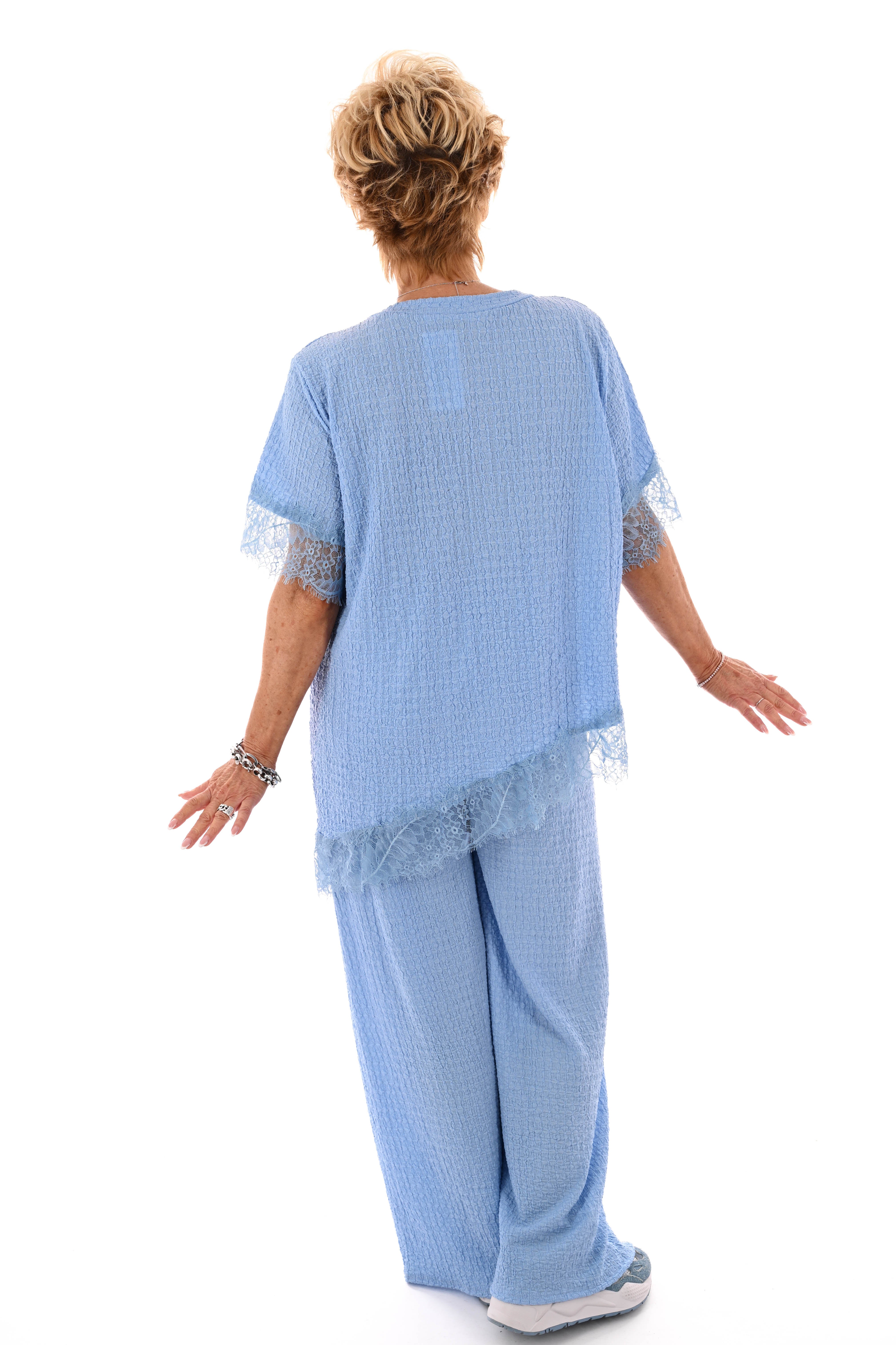 Tweedelig crepe set asymmetrisch lichtblauw