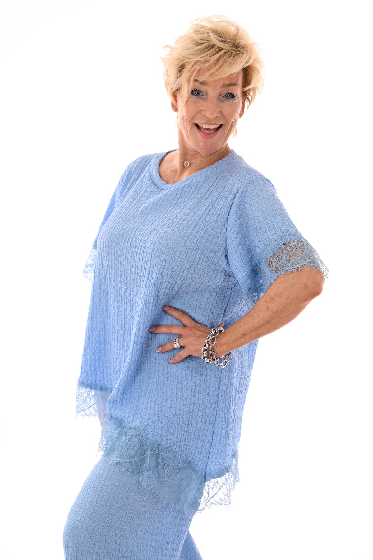 Tweedelig crepe set asymmetrisch lichtblauw