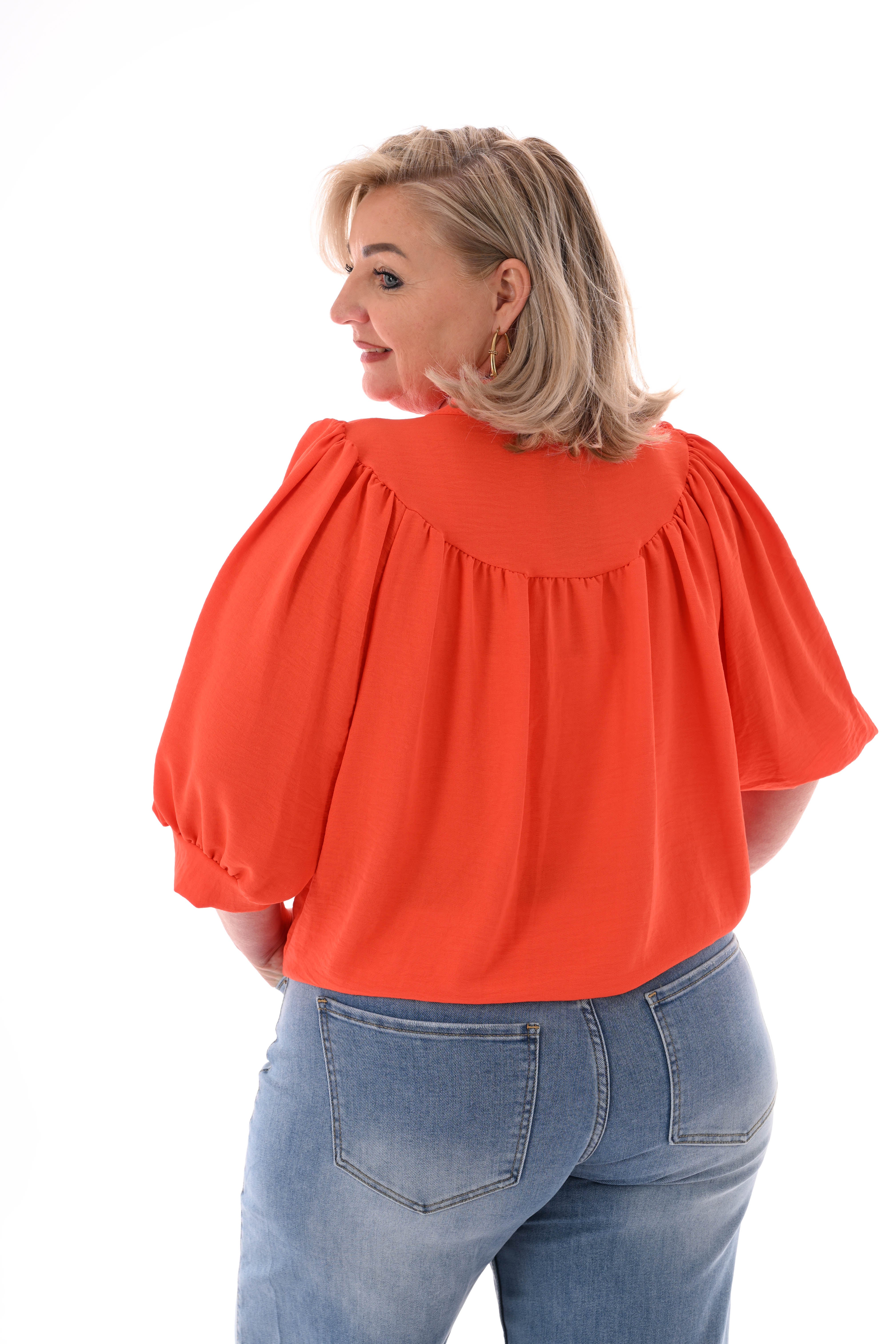 Doorknoop blouse korte pofmouwen uni donkeroranje