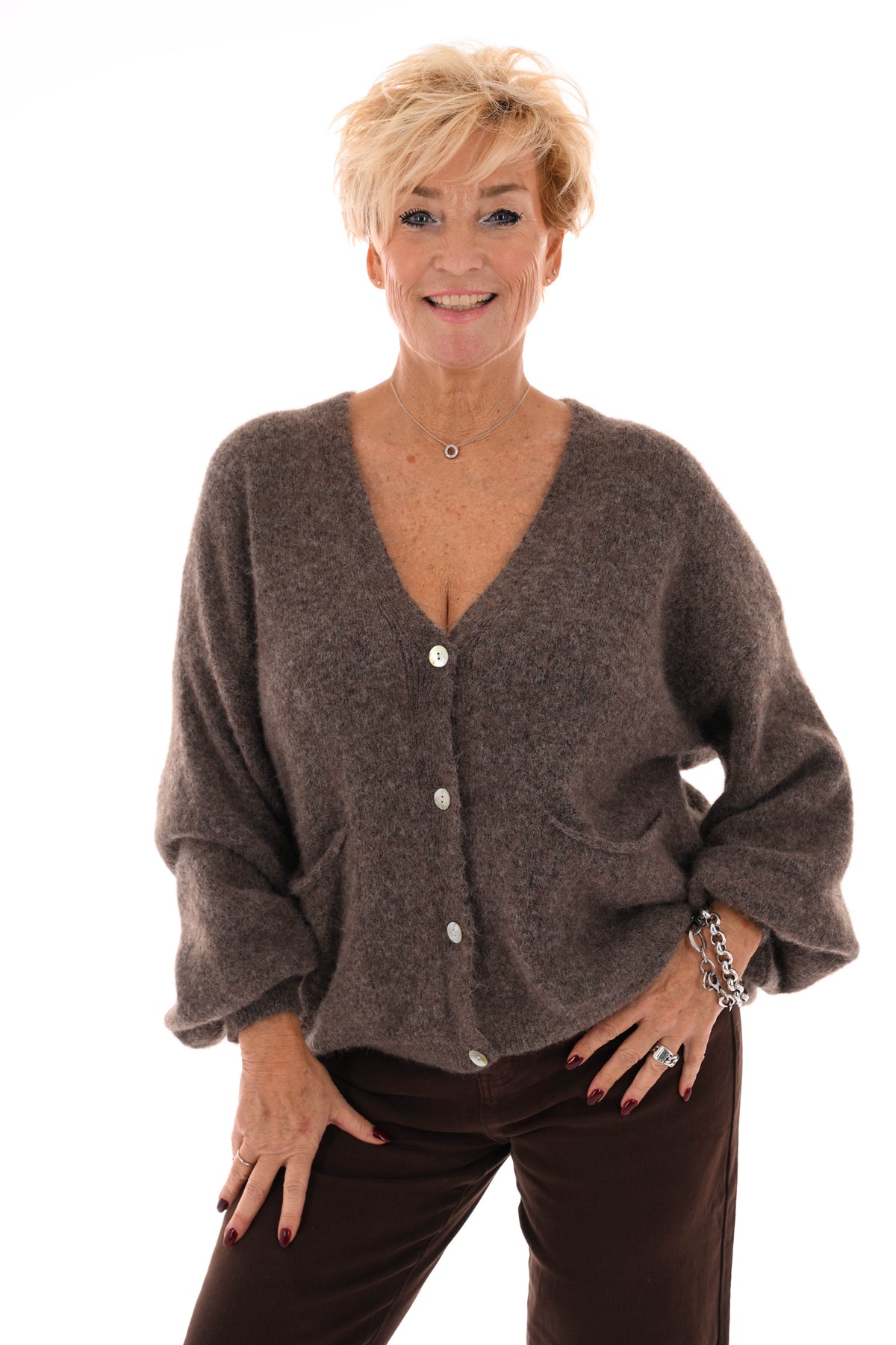 Kort gebreid vest pofmouwen taupe