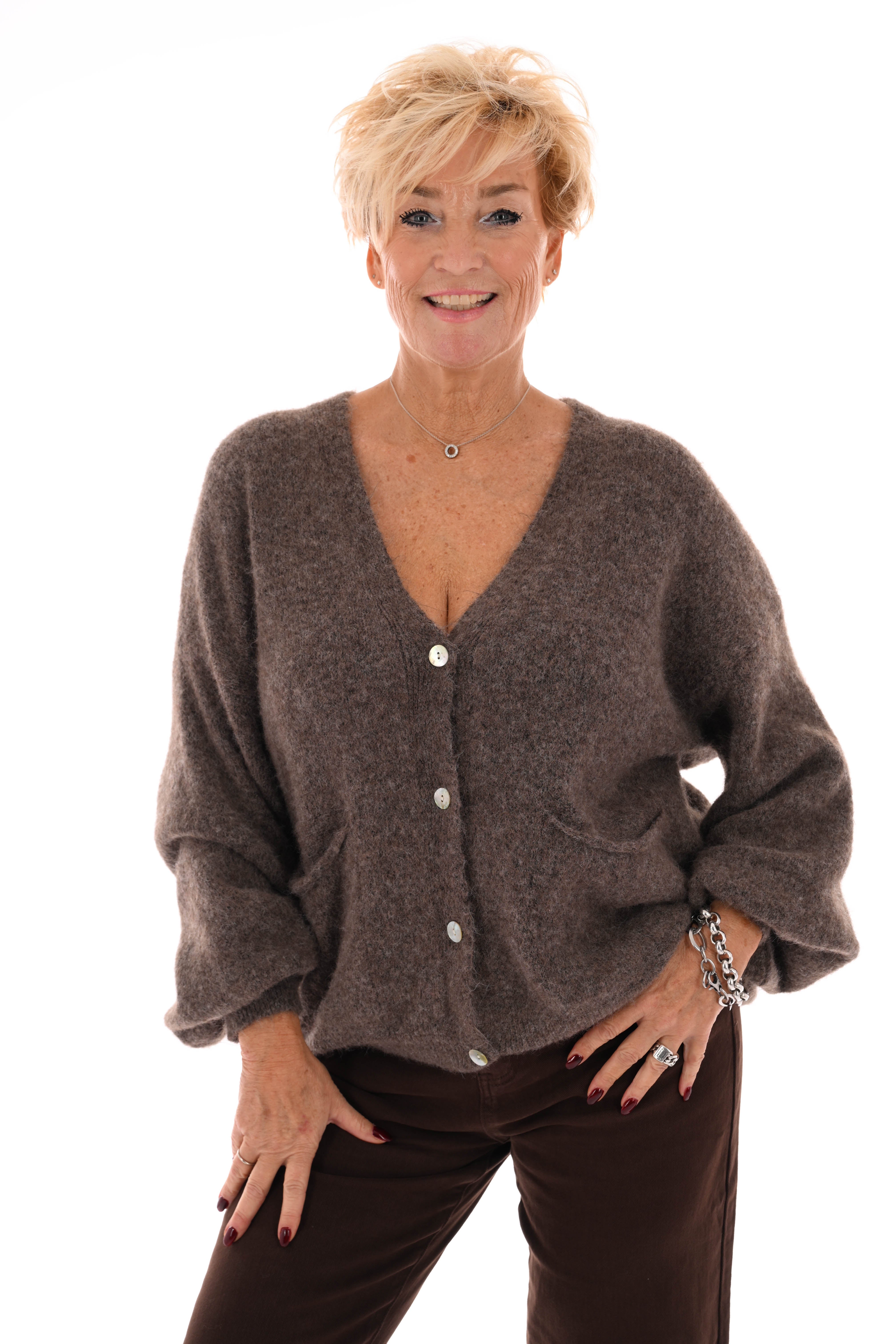 Kort gebreid vest pofmouwen taupe