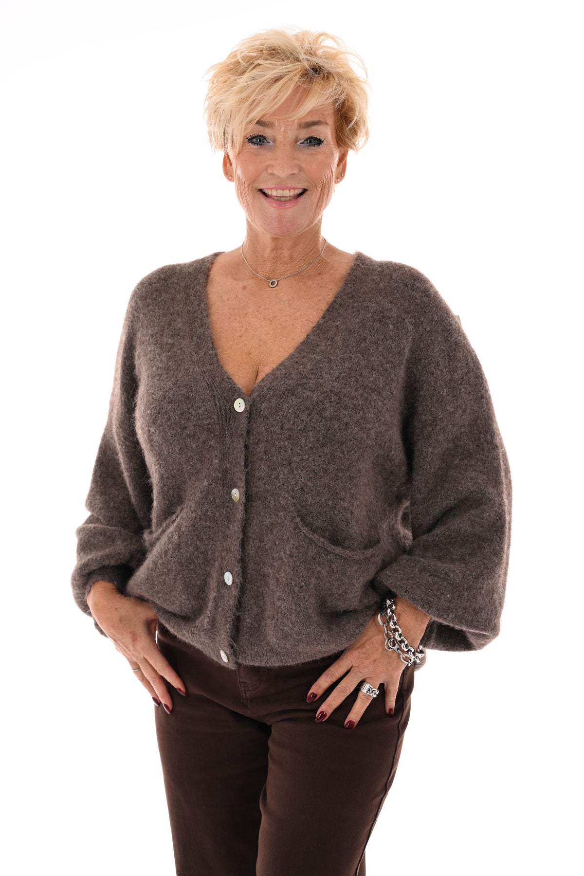 Kort gebreid vest pofmouwen taupe