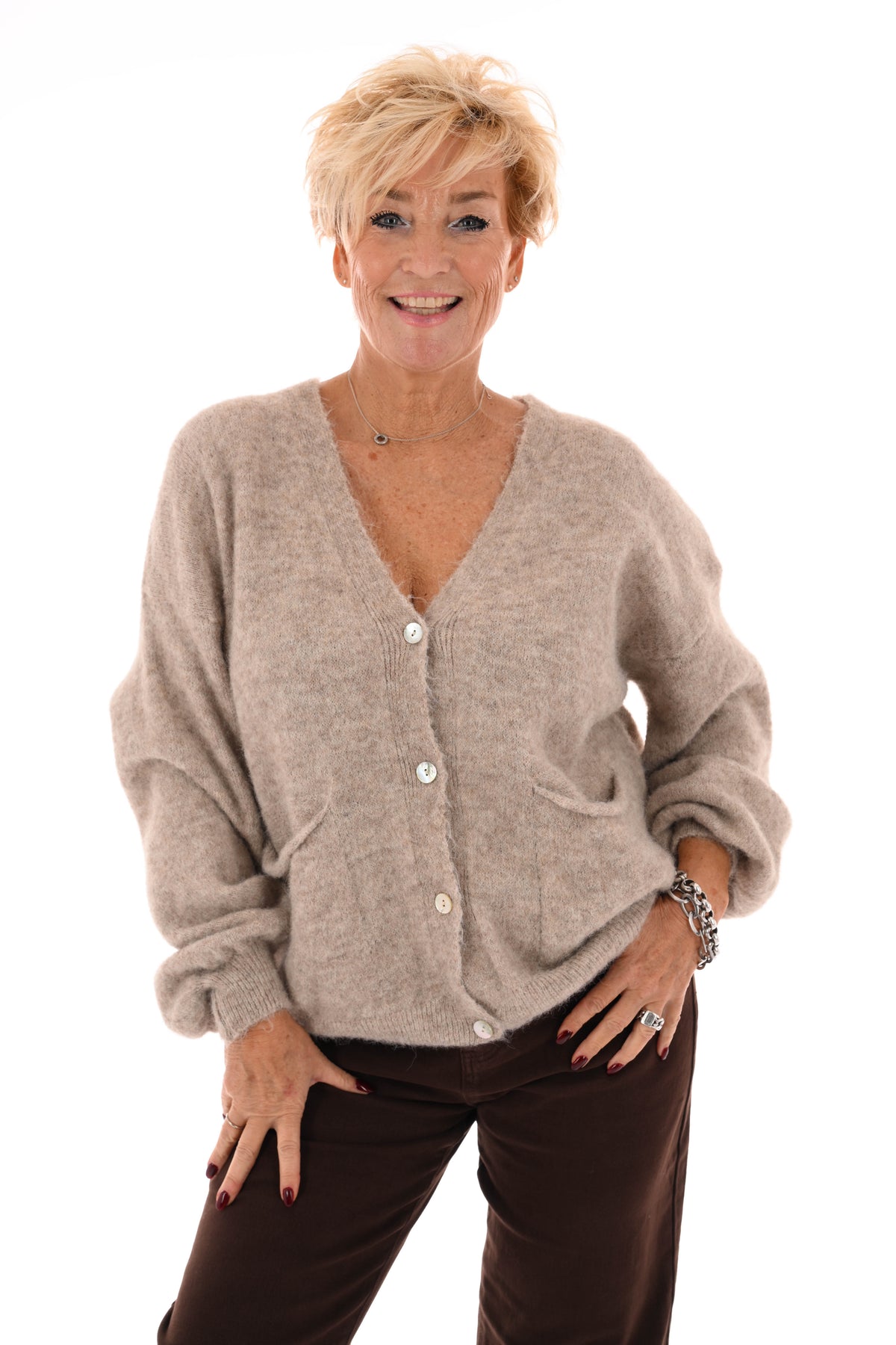 Kort gebreid vest pofmouwen beige