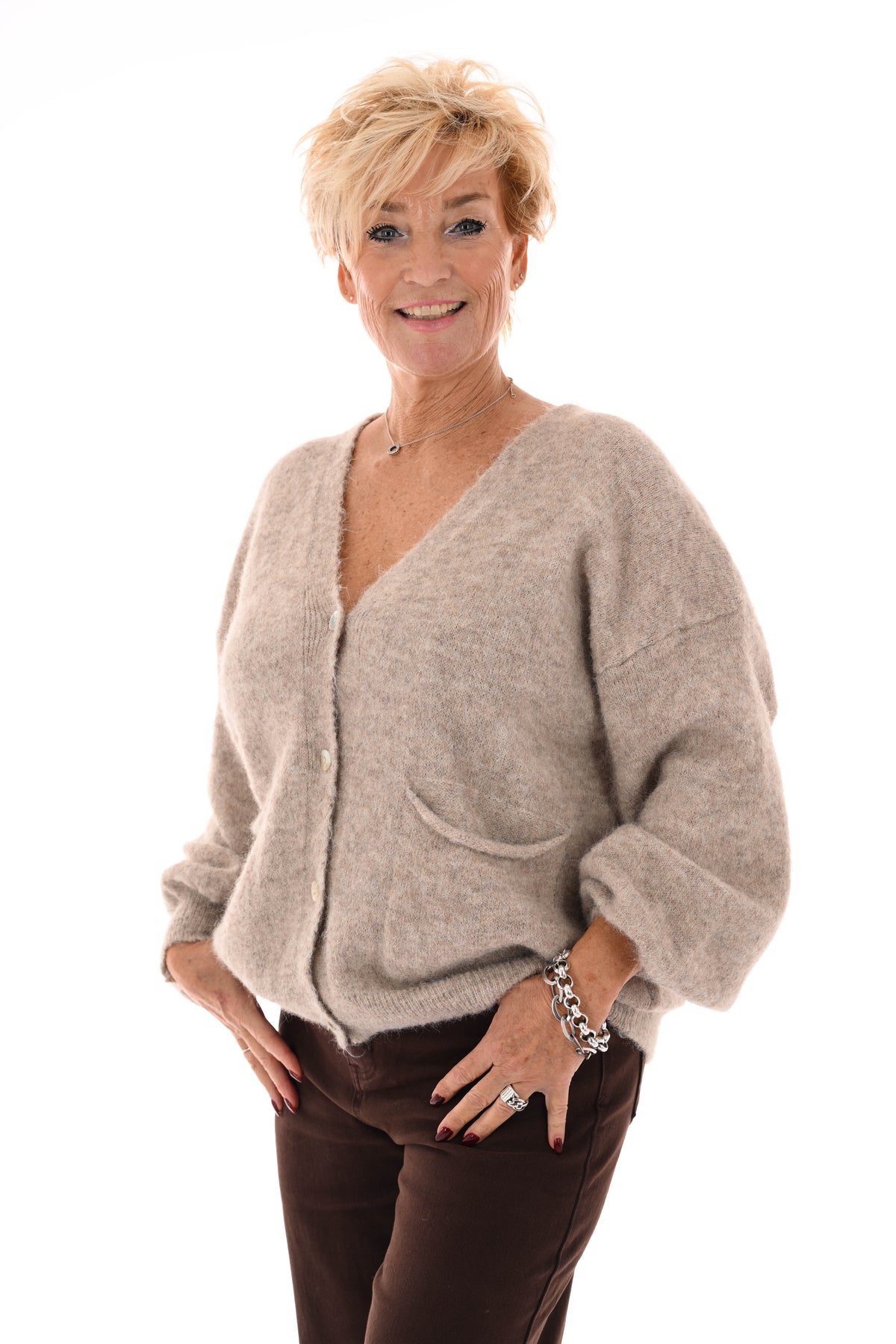 Kort gebreid vest pofmouwen beige