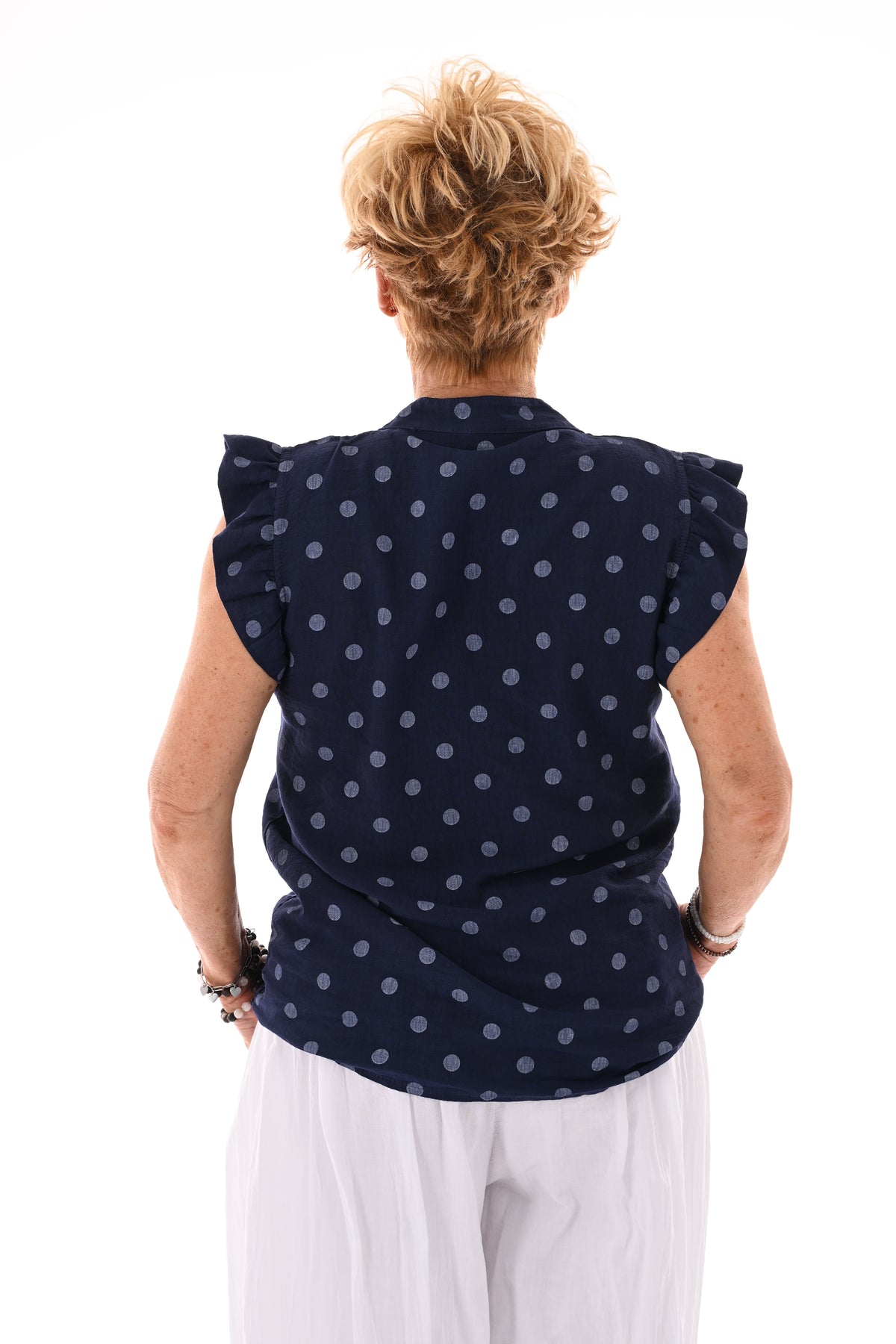 Dots blouse mouwloos met roezels marineblauw