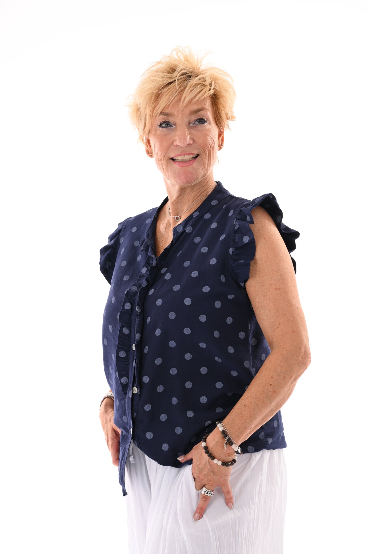 Dots blouse mouwloos met roezels marineblauw