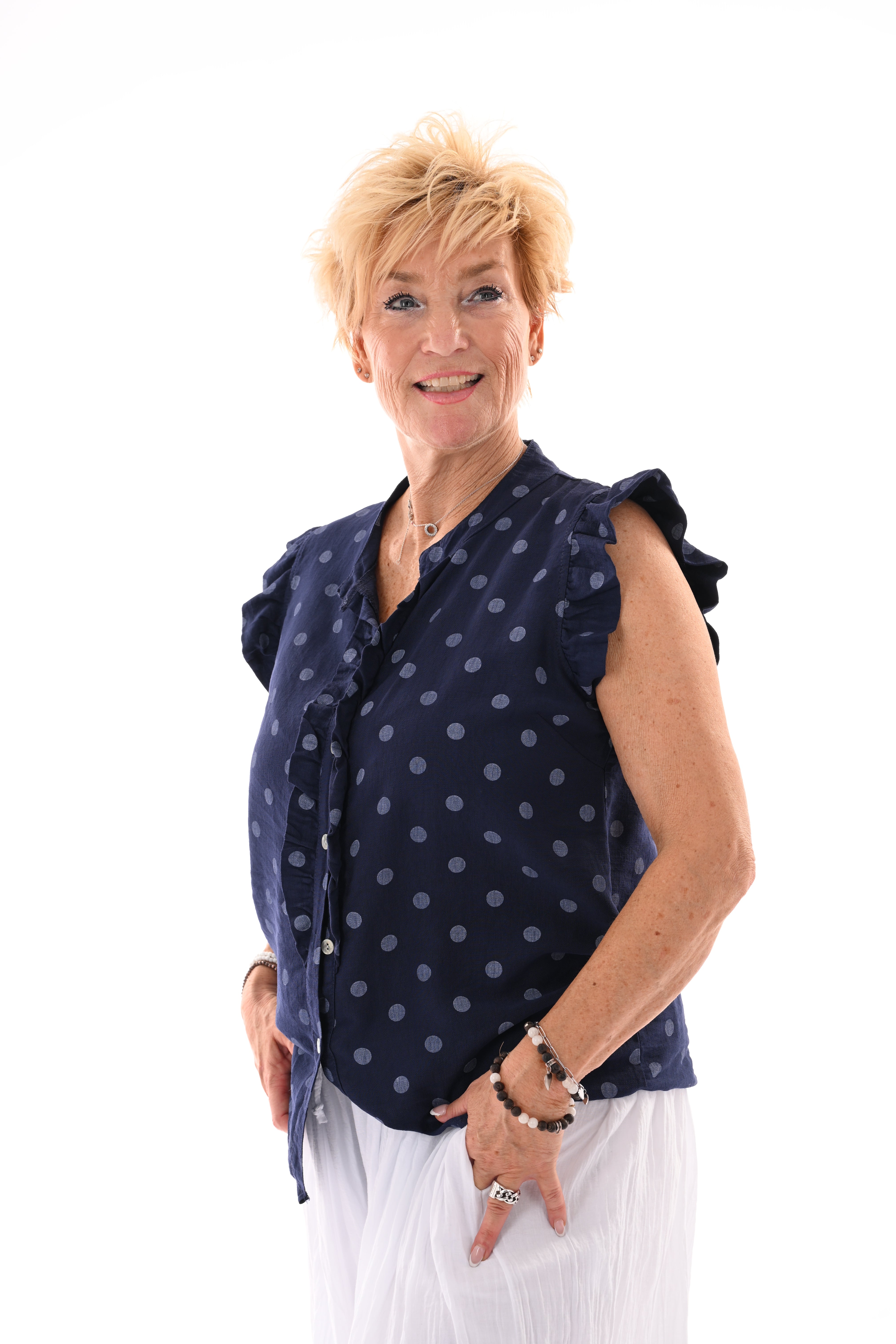 Dots blouse mouwloos met roezels marineblauw