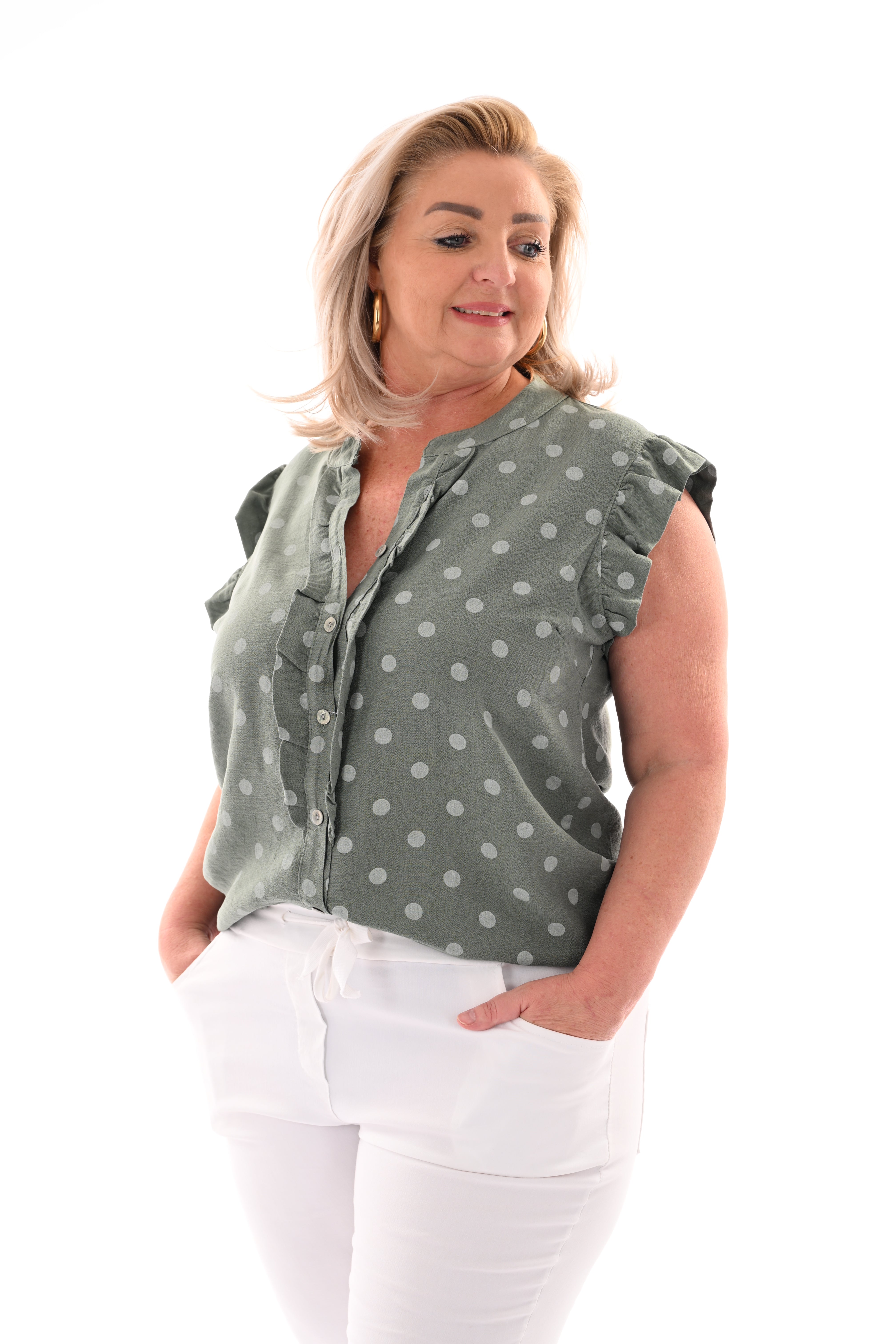 Dots blouse mouwloos met roezels lindegroen