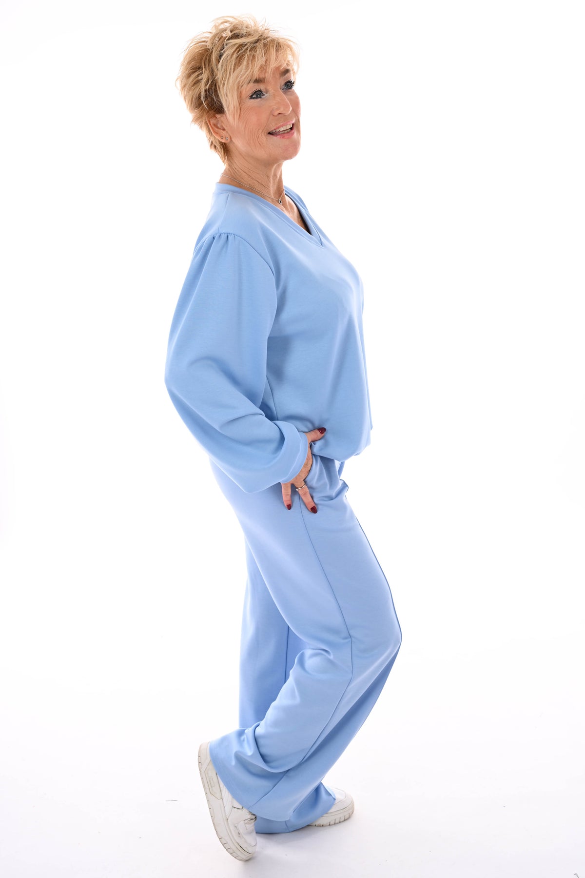 Tweedelig pak v-hals met boord uni lichtblauw