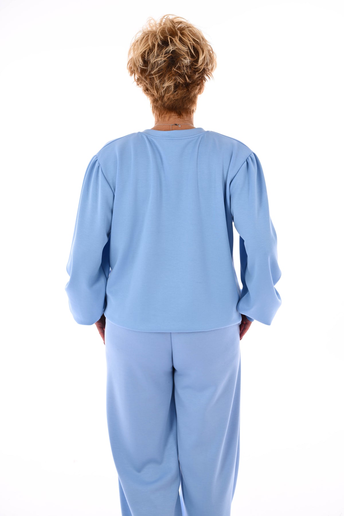 Tweedelig pak v-hals met boord uni lichtblauw