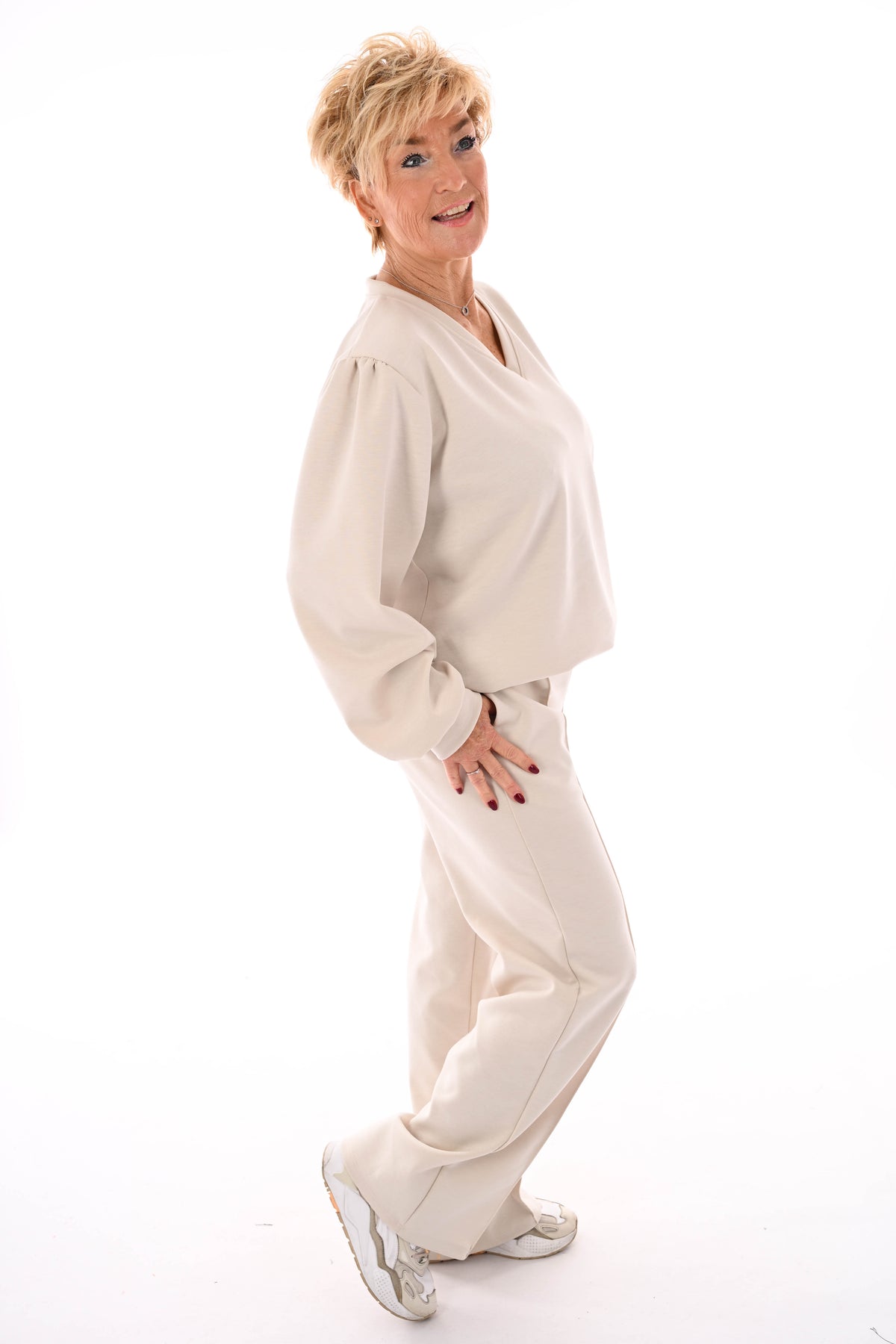 Tweedelig pak v-hals met boord uni beige