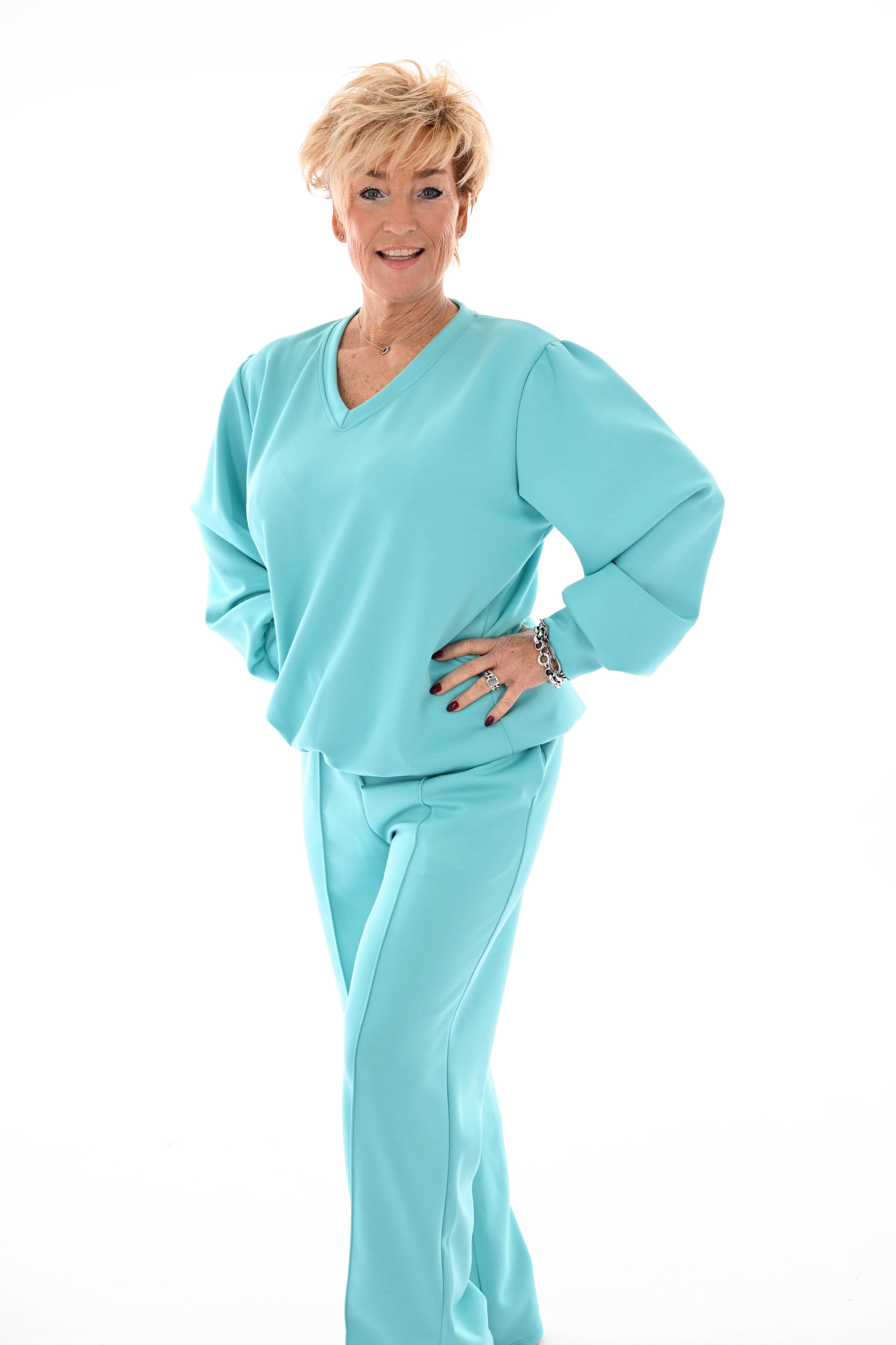 Tweedelig pak v-hals met boord uni aqua