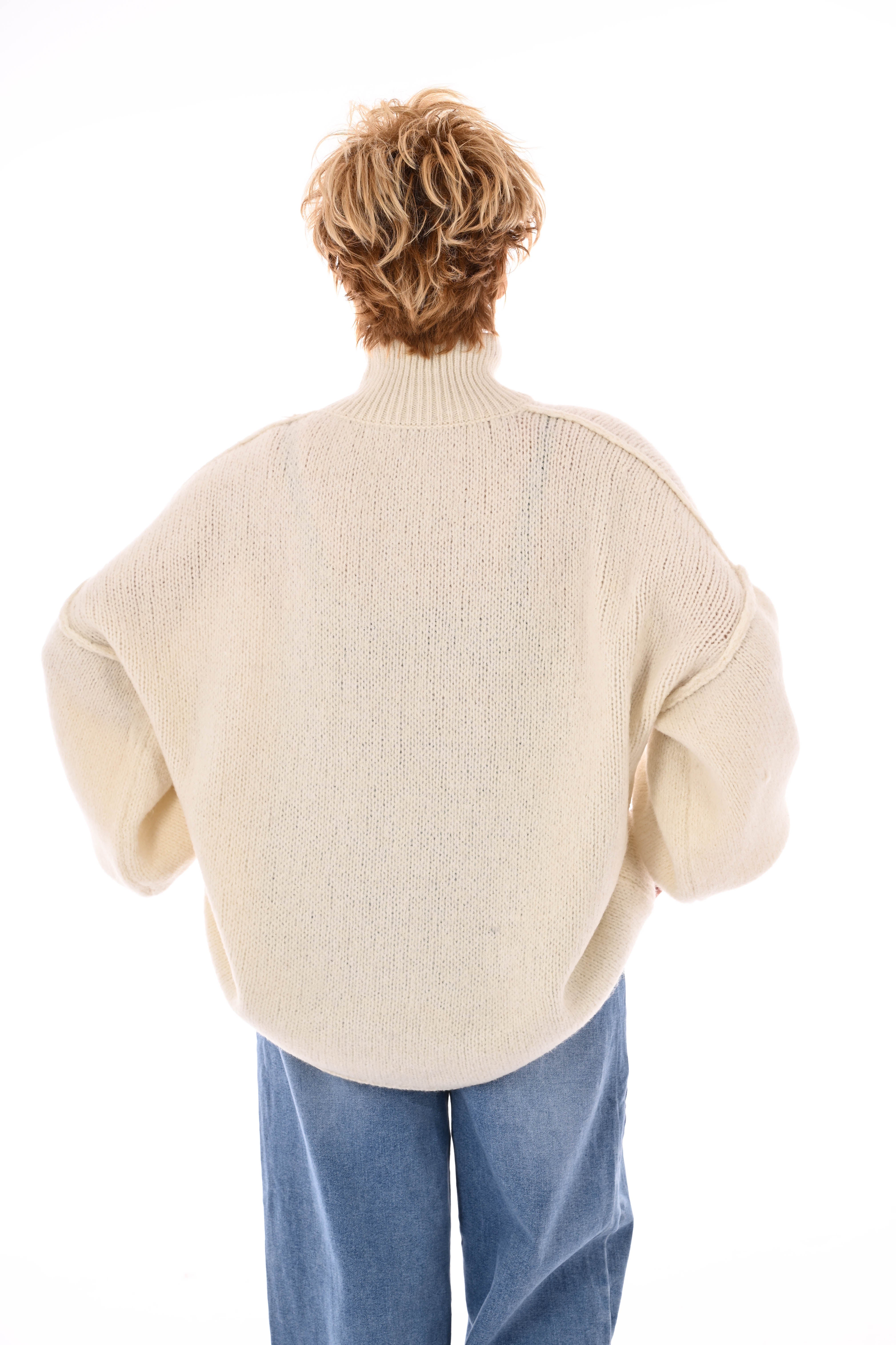 Gebreide trui turtle neck met pofmouwen roomwit