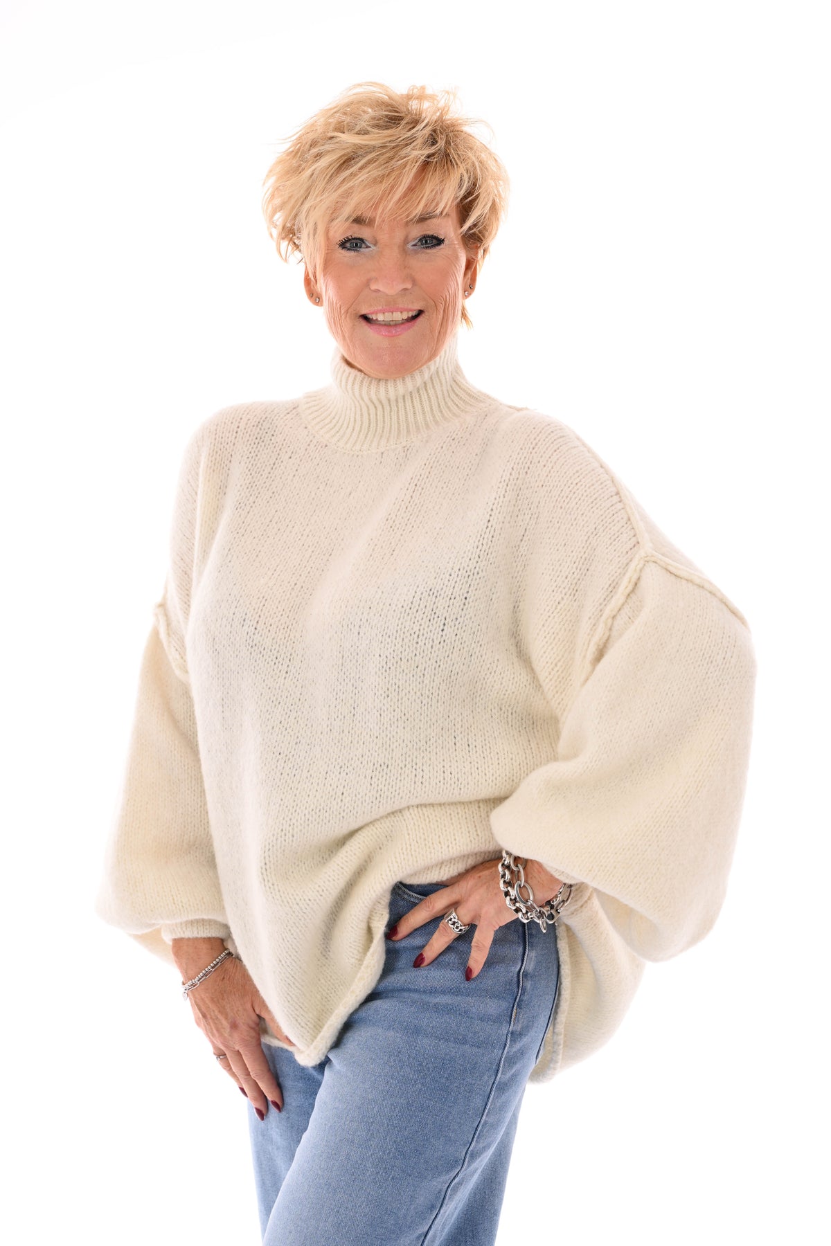Gebreide trui turtle neck met pofmouwen roomwit