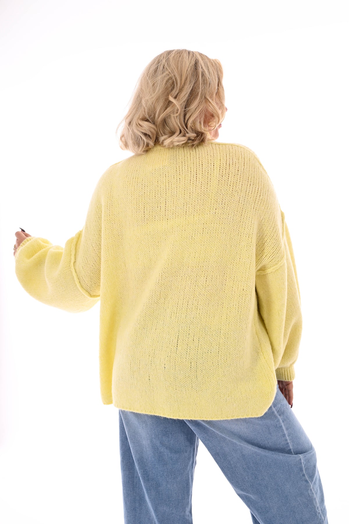 Gebreide trui turtle neck met pofmouwen lichtgeel