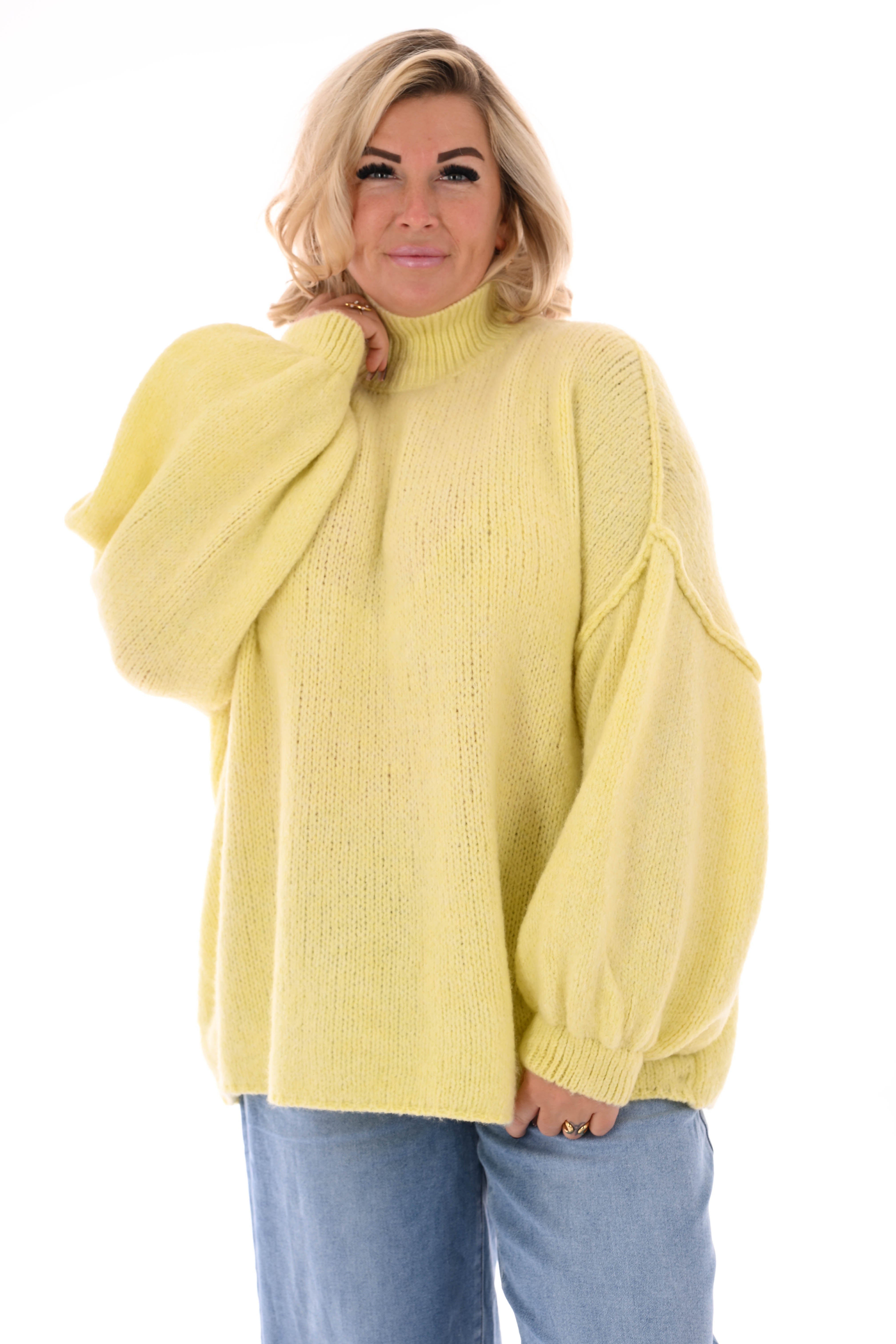 Gebreide trui turtle neck met pofmouwen lichtgeel