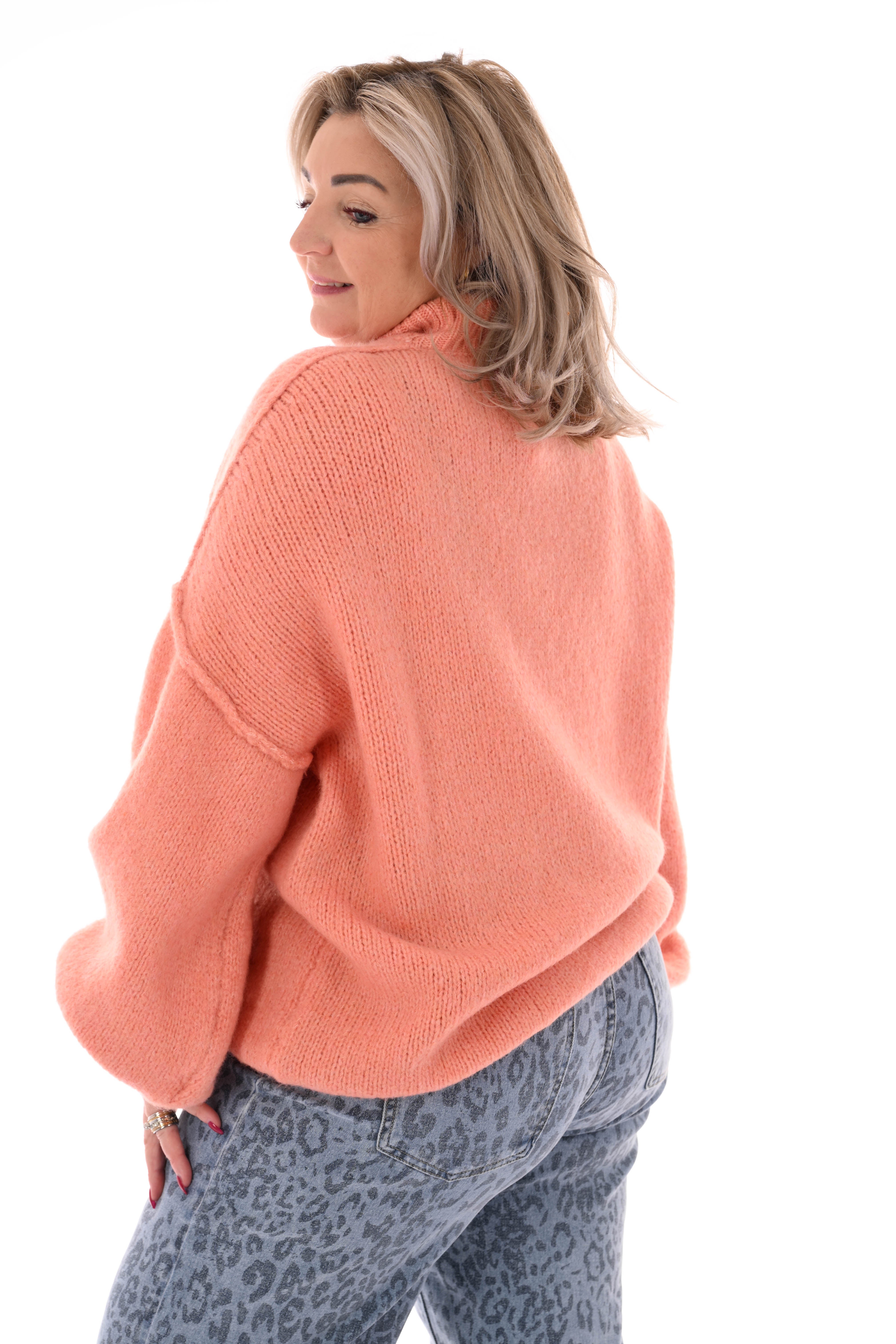 Gebreide trui turtle neck met pofmouwen zalm