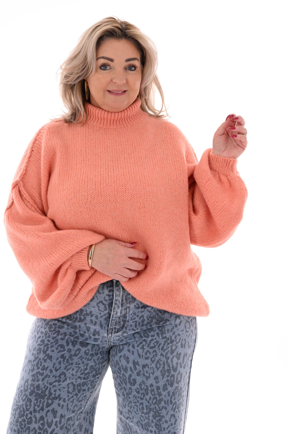 Gebreide trui turtle neck met pofmouwen zalm