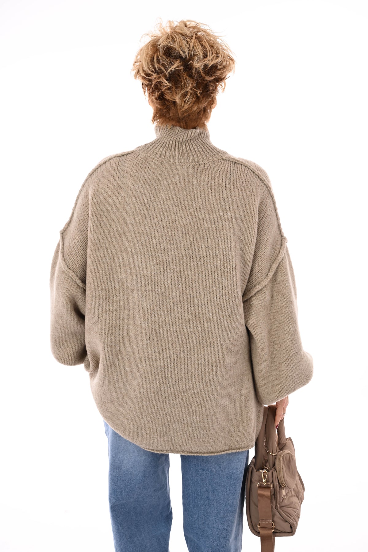 Gebreide trui turtle neck met pofmouwen beige