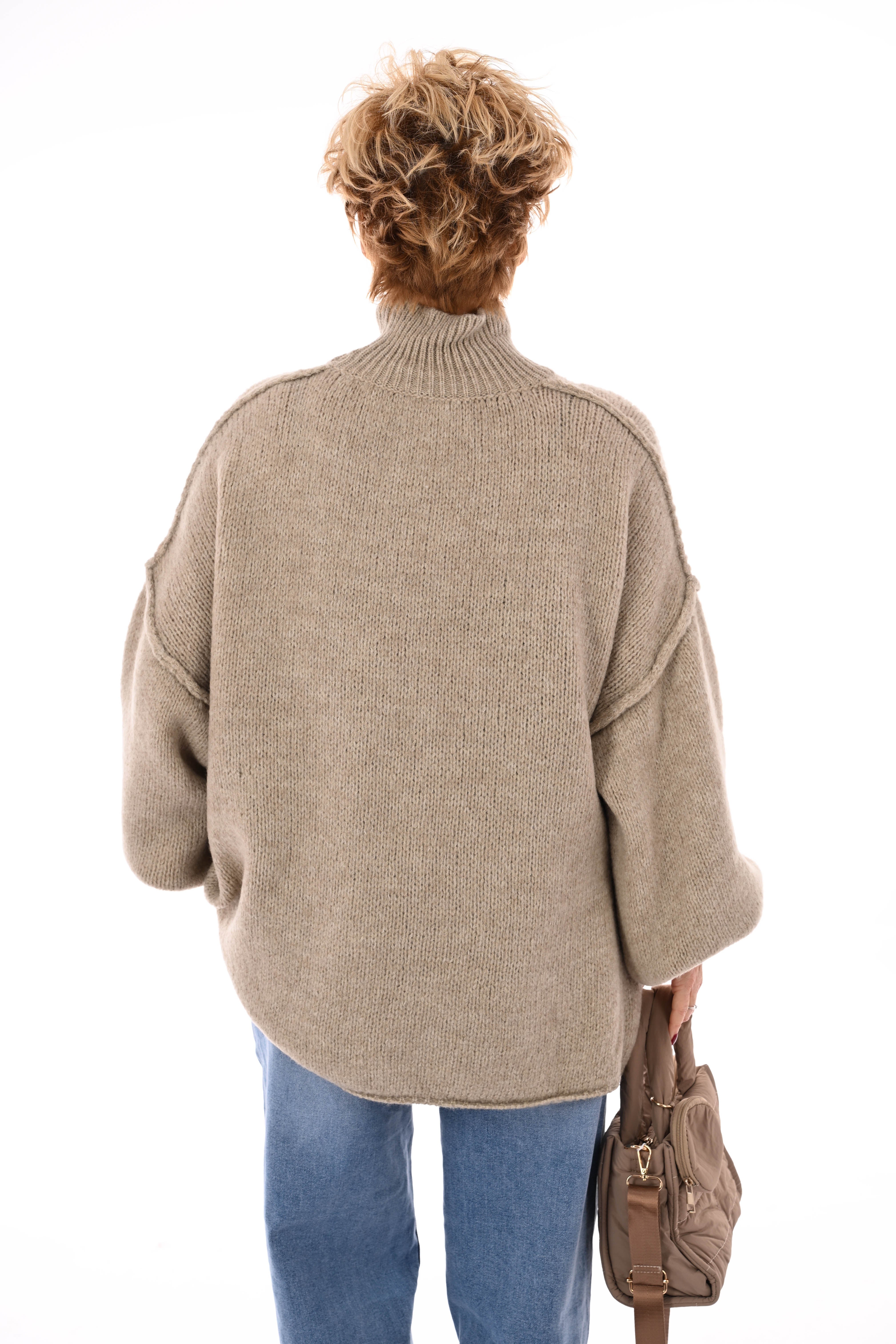 Gebreide trui turtle neck met pofmouwen beige