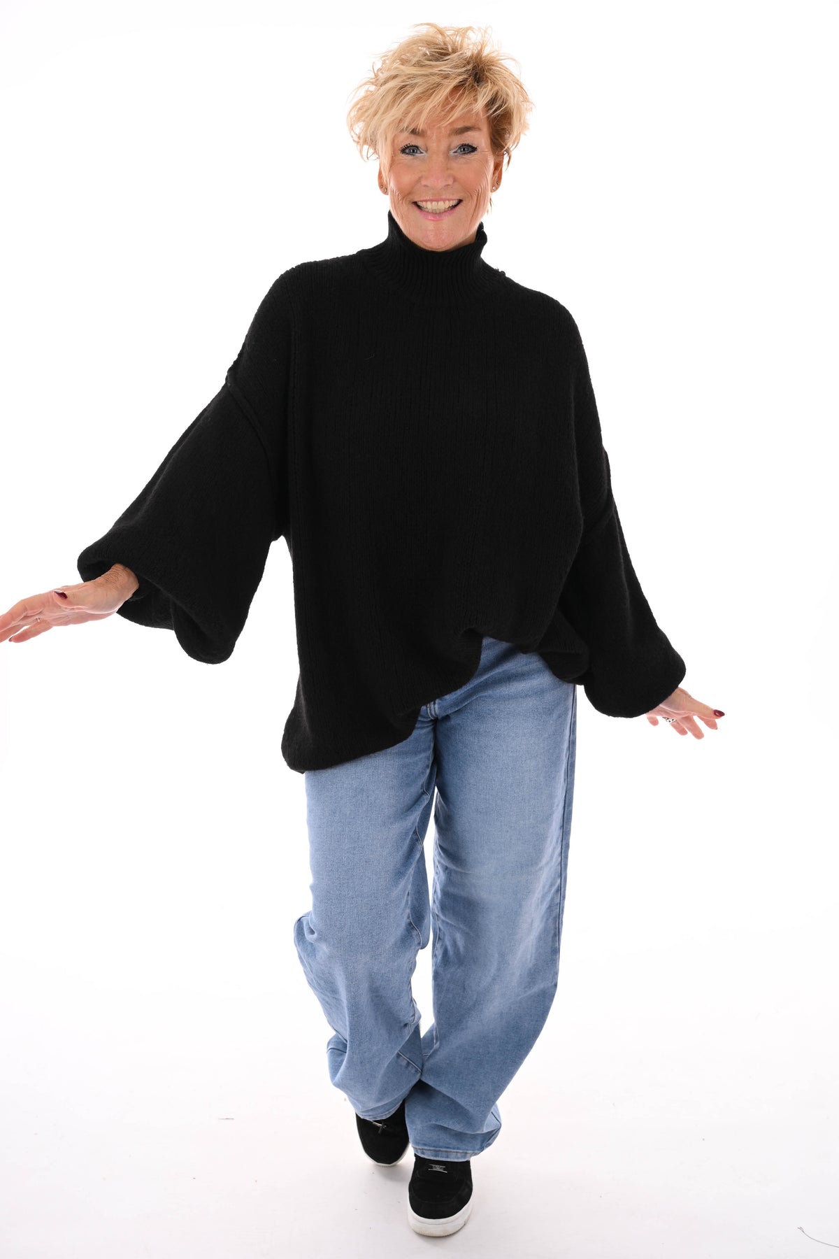 Gebreide trui turtle neck met pofmouwen zwart