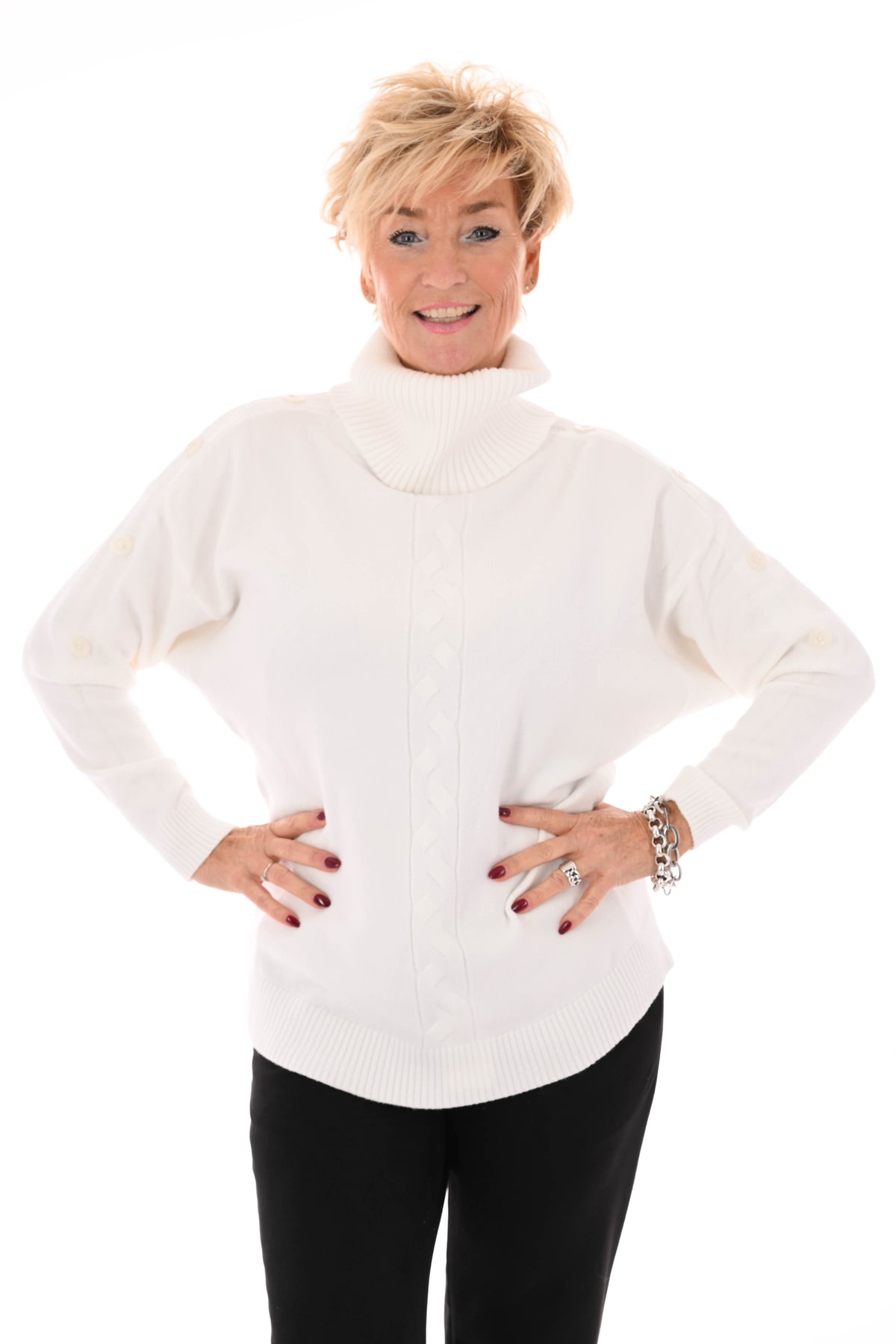 Losse coltrui met knopen roomwit