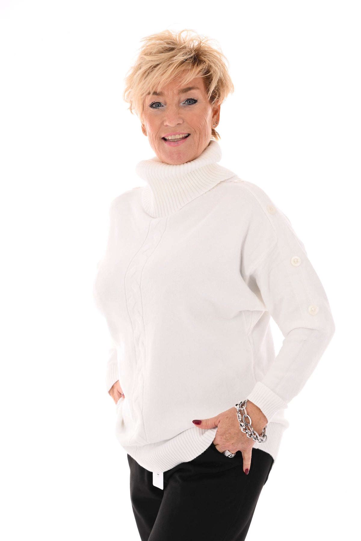 Losse coltrui met knopen roomwit