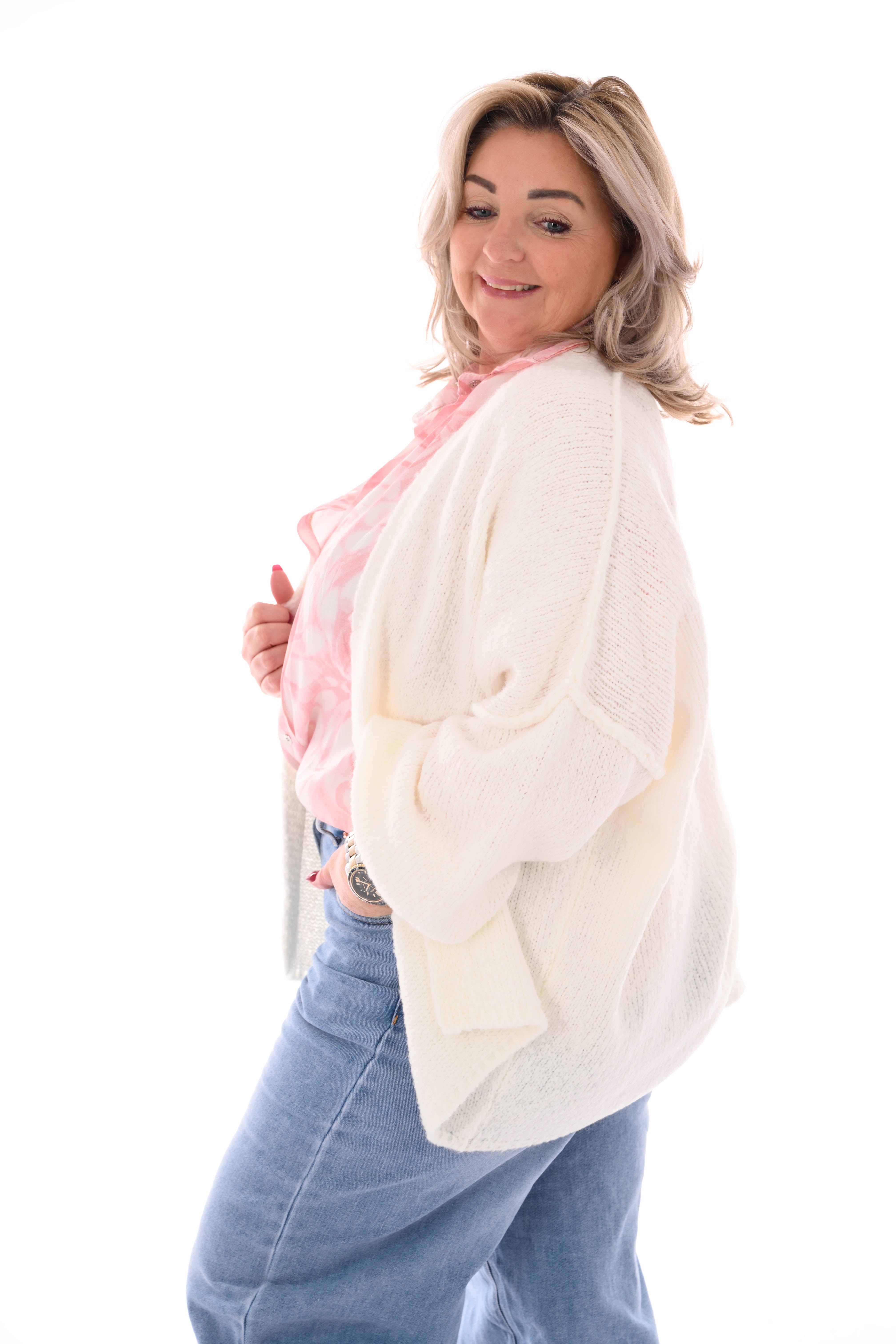 Gebreid vest met naad roomwit