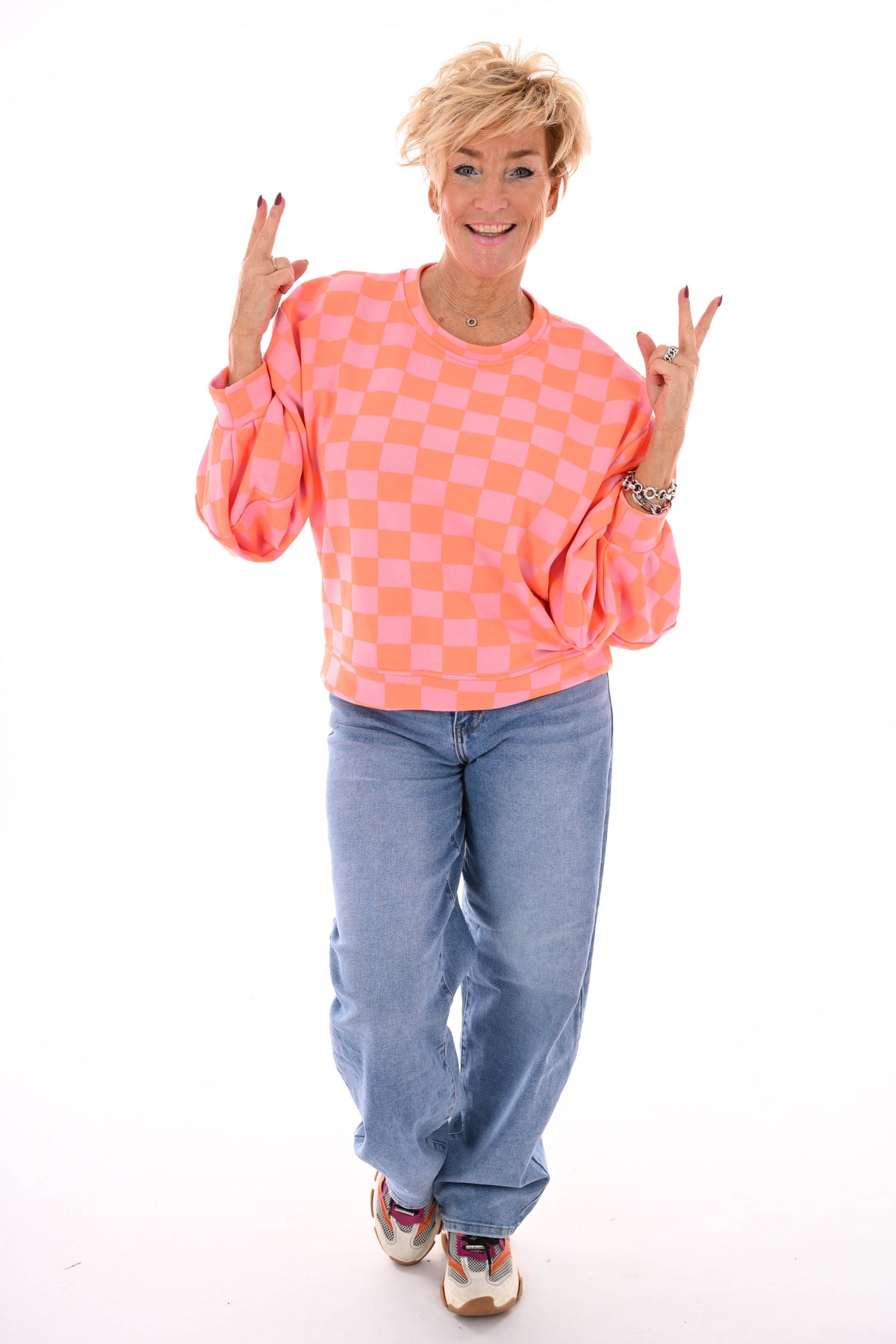 Geblokte sweater lichtroze/oranje