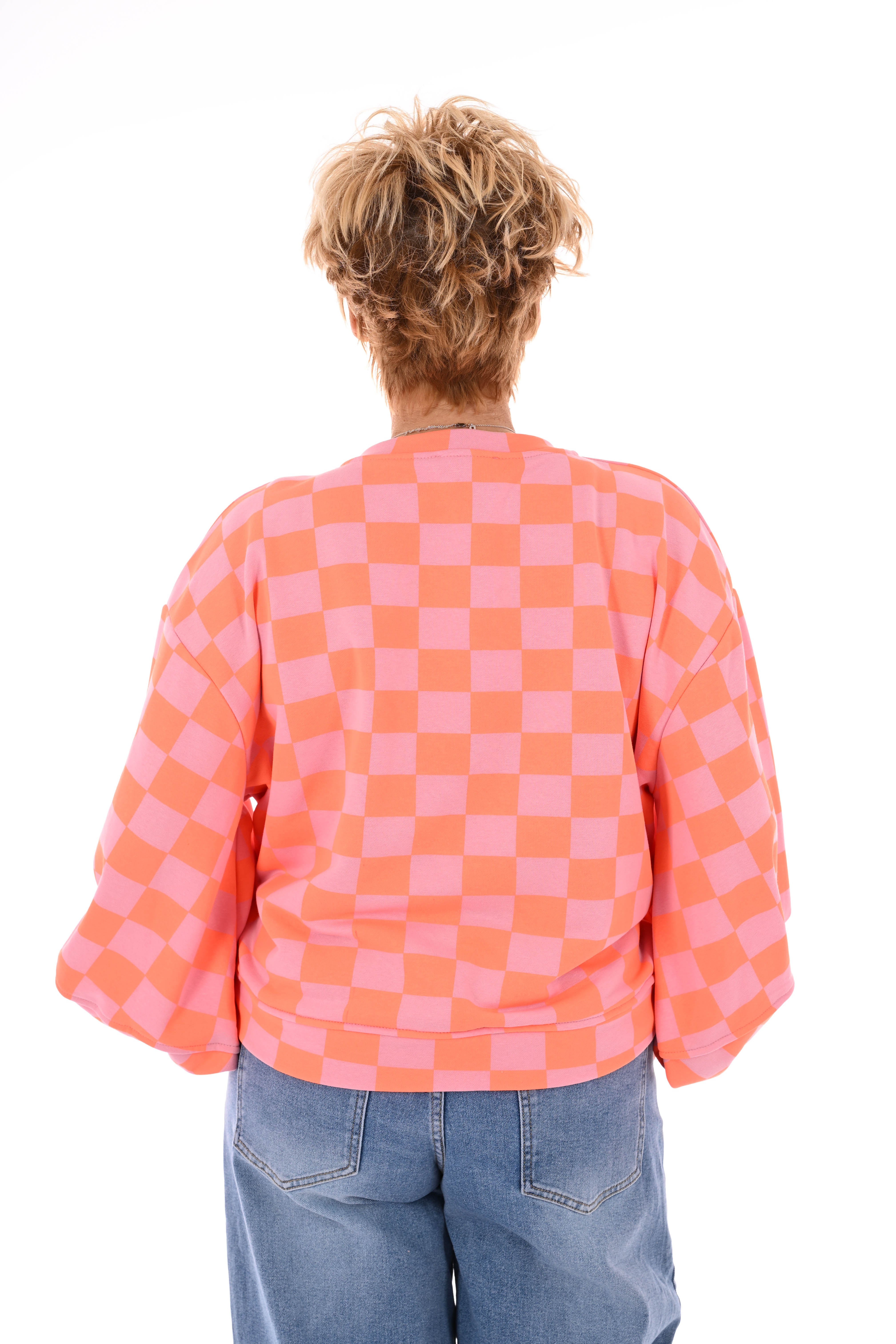 Geblokte sweater lichtroze/oranje