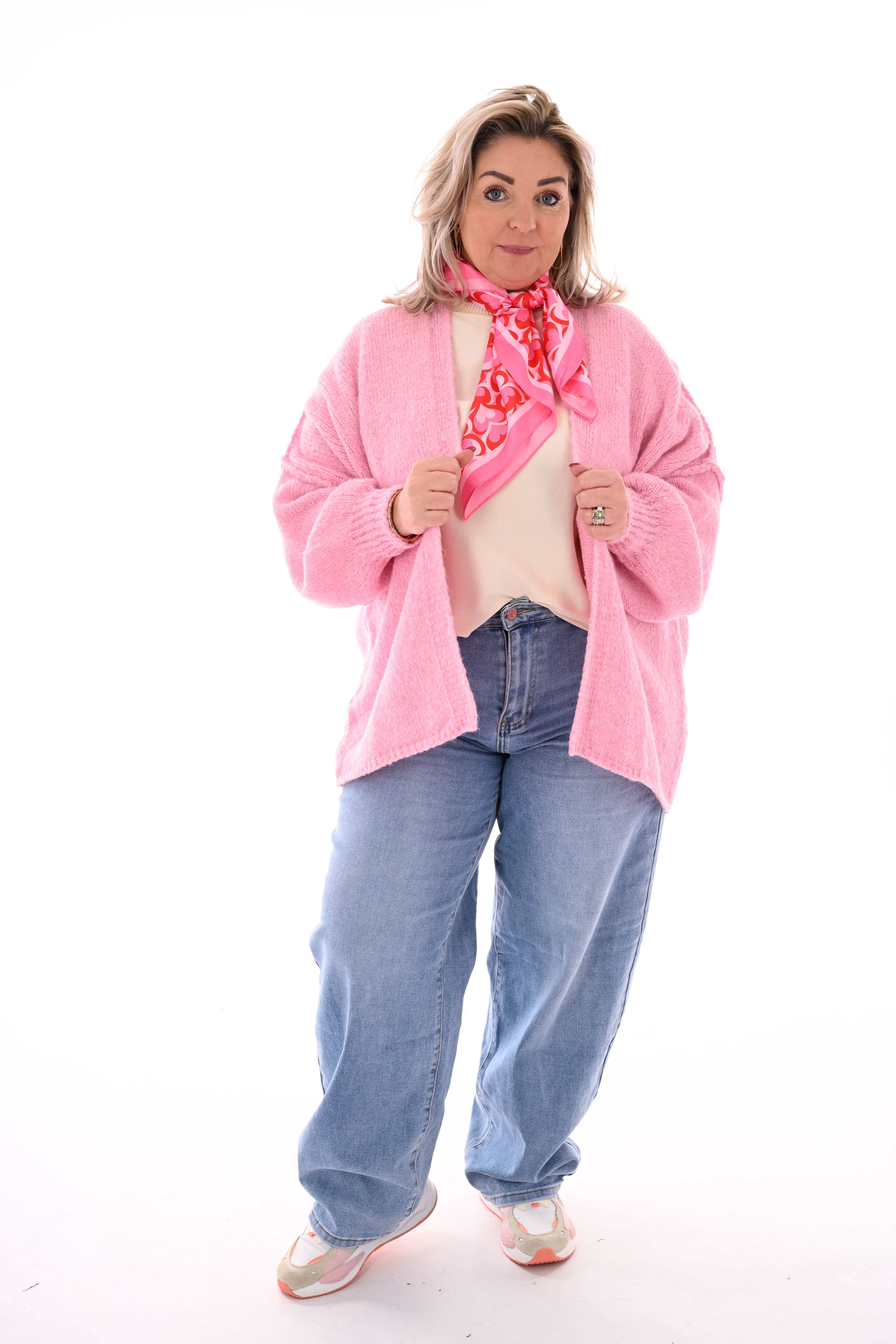 Gebreid vest met naad lichtroze