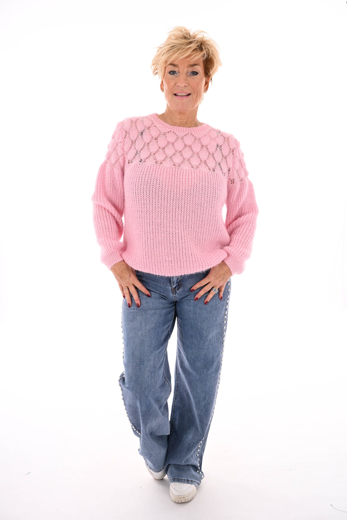 Gehaakte trui hals detail lichtroze