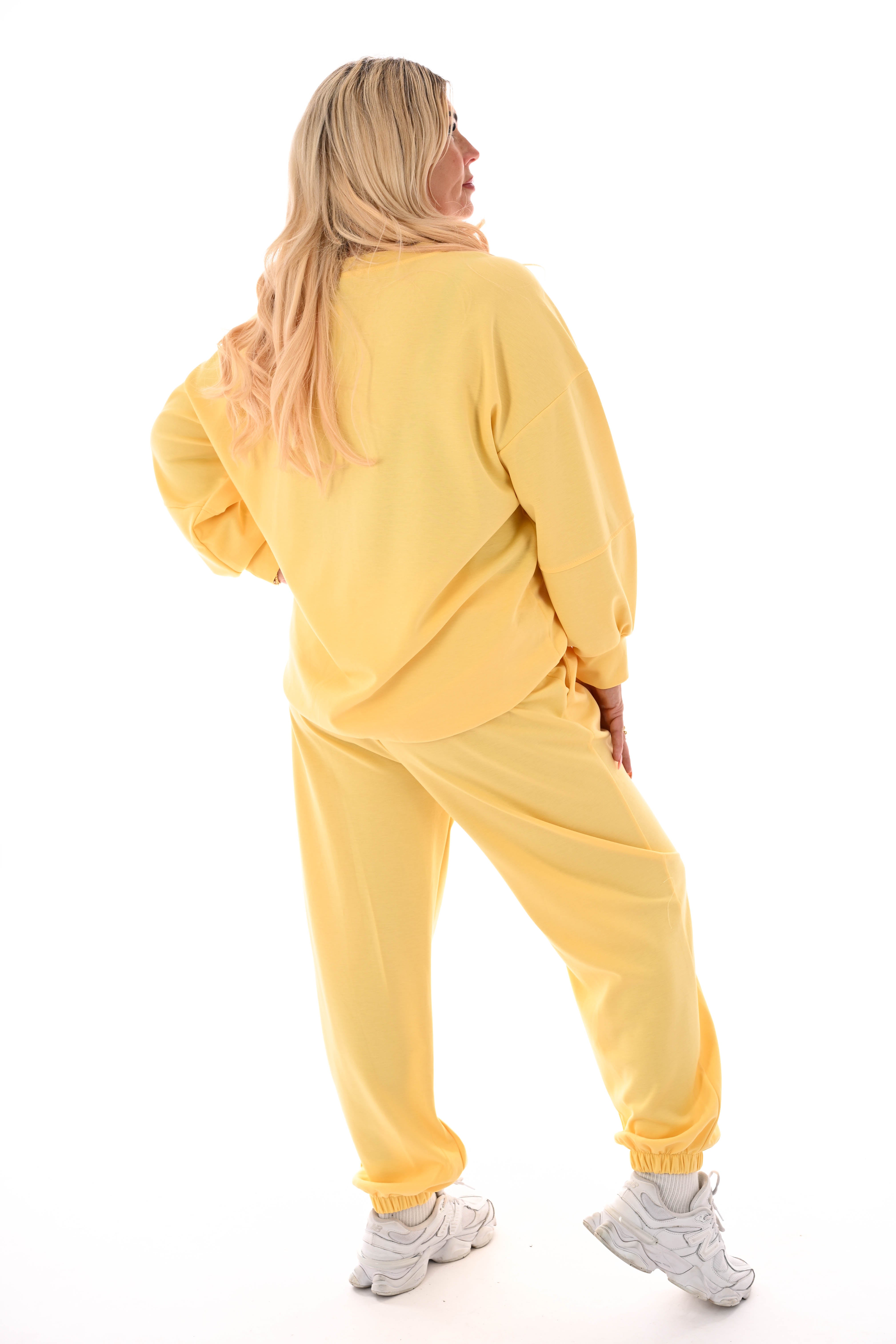 Tweedelig joggingspak H geel