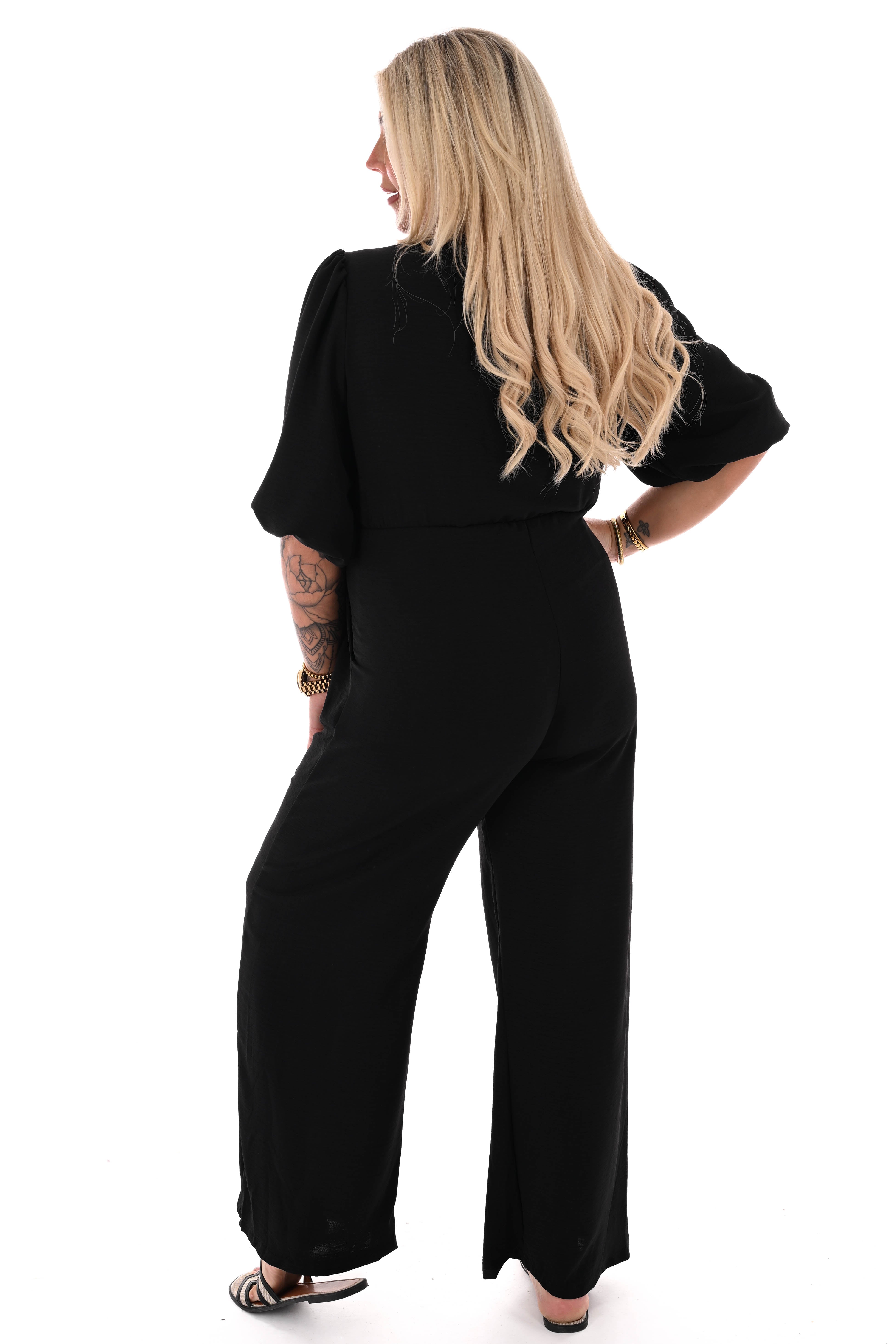 Jumpsuit overslag uni 3/4e pofmouwen zwart