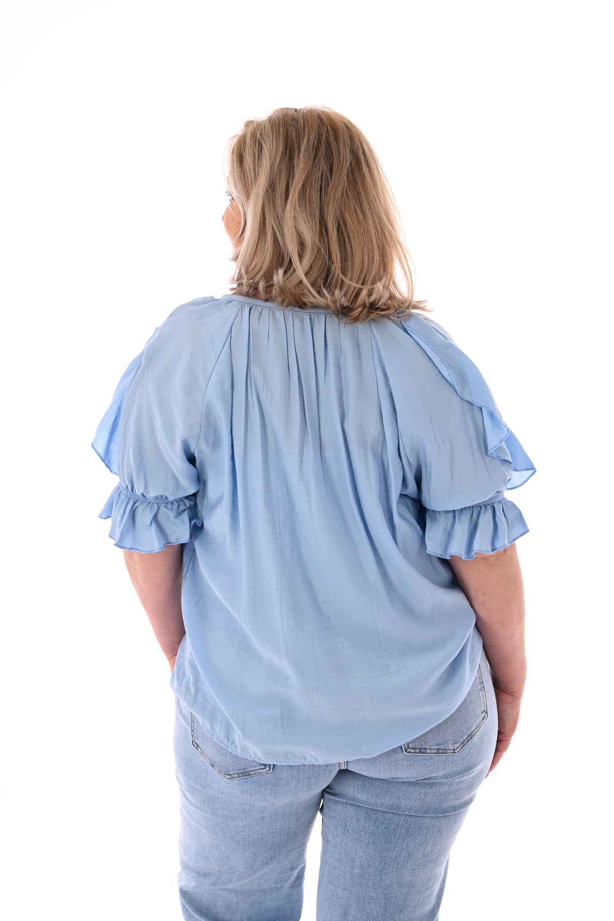 Blouse v-hals met roezel en korte mouwen lichtblauw