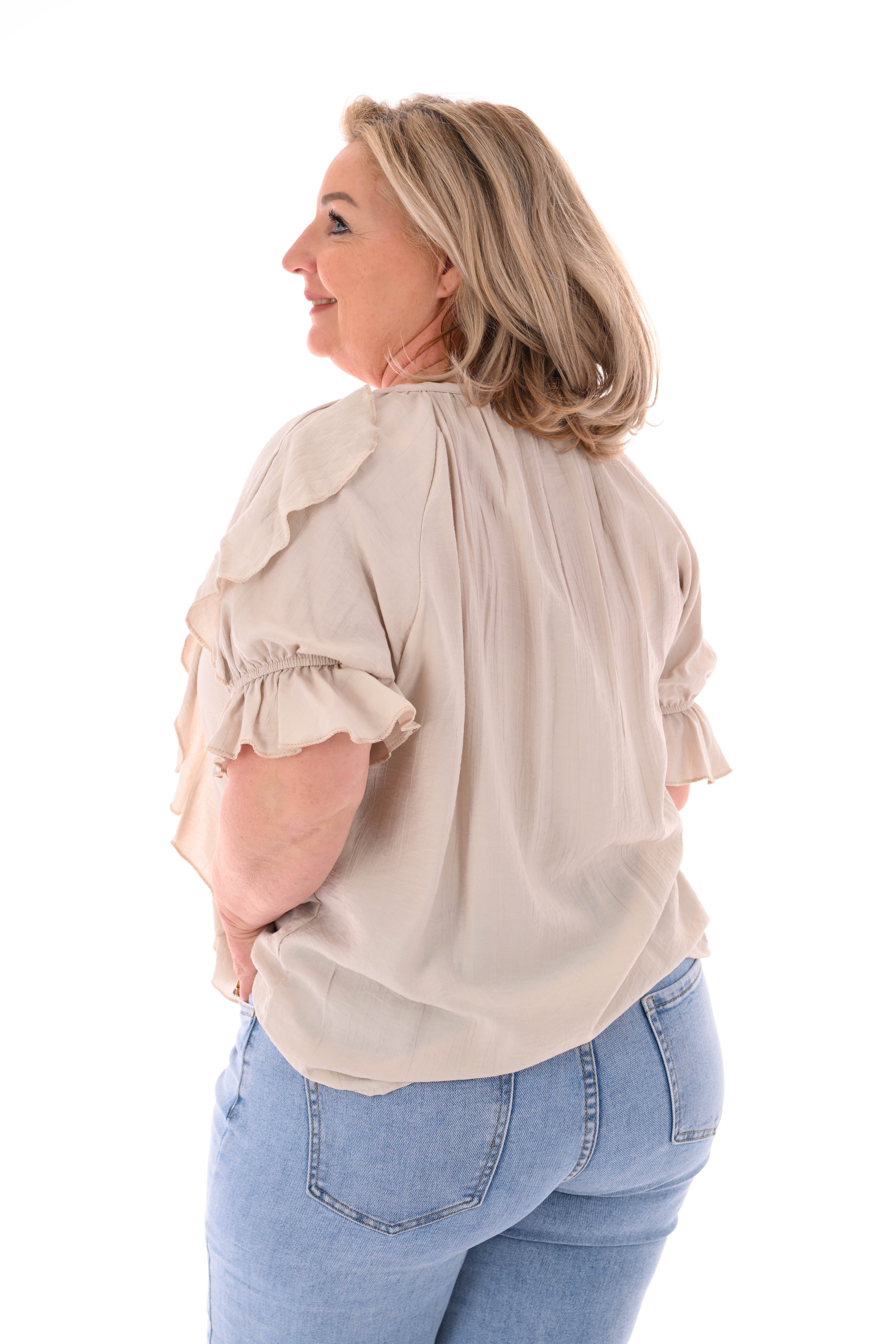 Blouse v-hals met roezel en korte mouwen beige