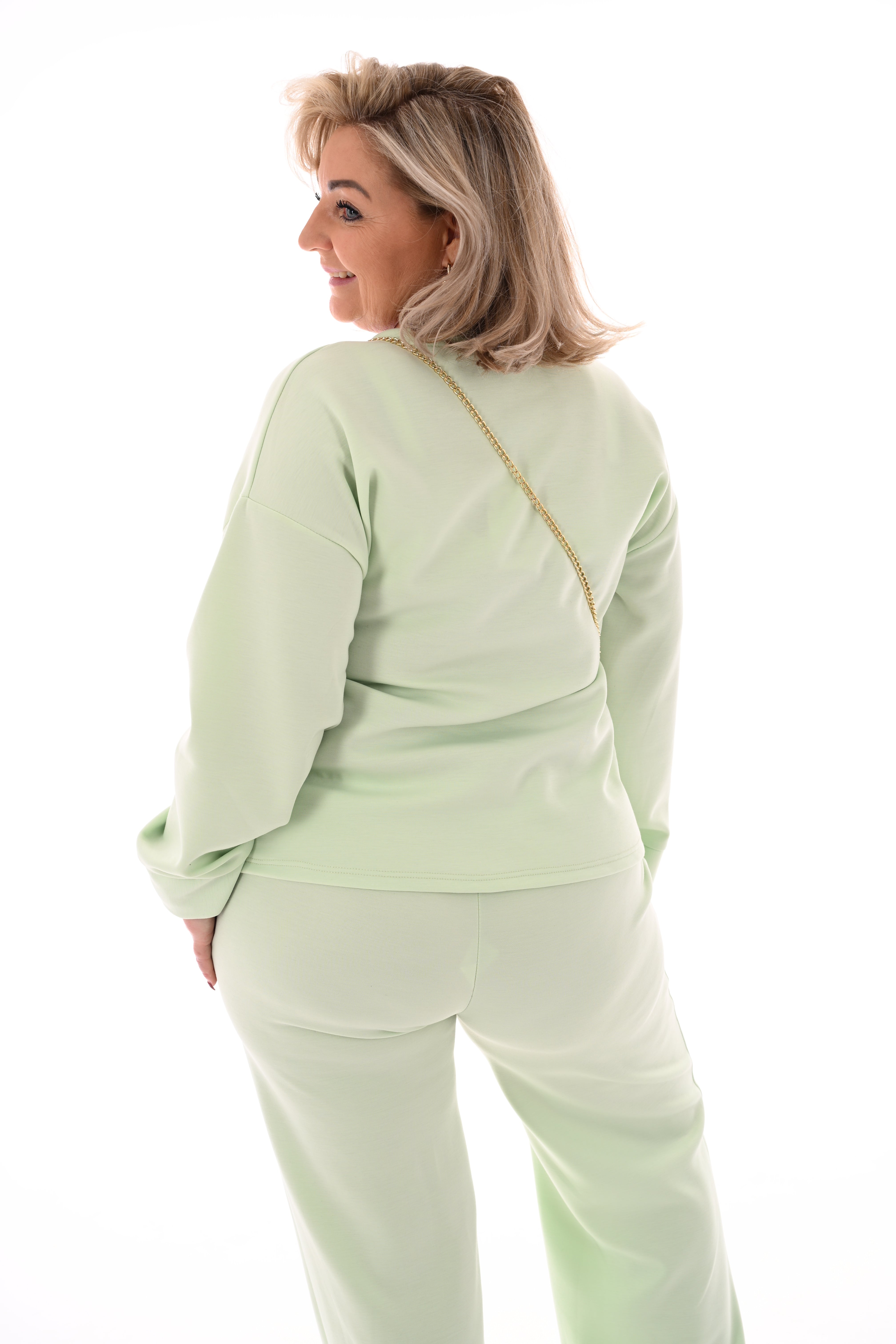 Tweedelig pak knoop detail lichtgroen