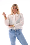 Blouse pofmouwen met strik roomwit